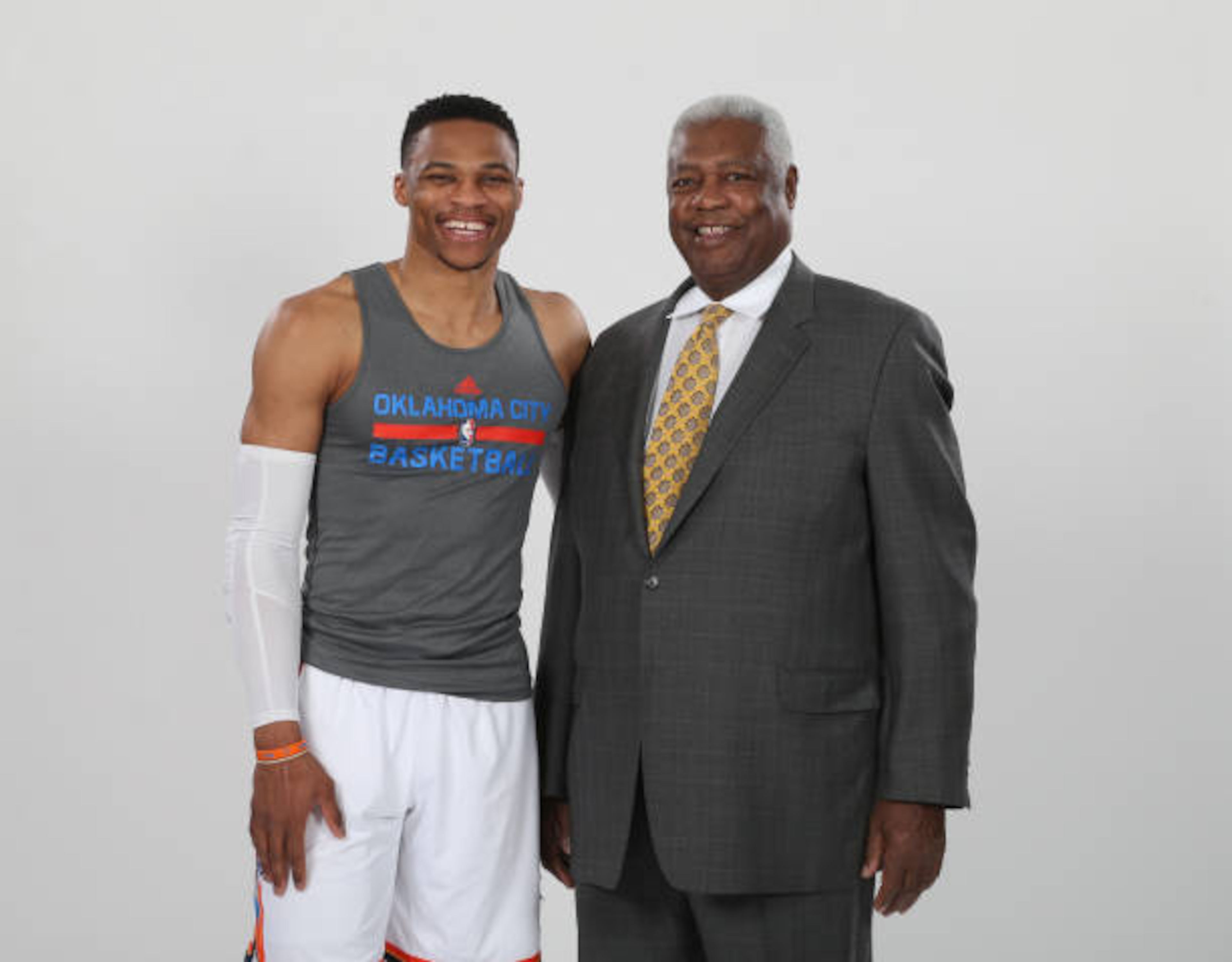 OKLAHOMA CITY, OK - APRIL 12:  Russell Westbrook #0 of the Oklahoma City Thunder poses for a photo with NBA Legend Oscar Robertson on April 12, 2017 at Chesapeake Energy Arena in Oklahoma City, OK. NOTE TO USER: User expressly acknowledges and agrees that, by downloading and/or using this photograph, user is consenting to the terms and conditions of the Getty Images License Agreement. Mandatory Copyright Notice: Copyright 2017 NBAE (Photo by Layne Murdoch/NBAE via Getty Images)