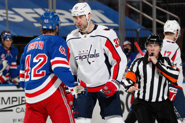 NEW YORK, NY - MAY 05:  Zdeno Chara #33 of the Washington Capitals exchanges words with Brendan Smith #42 of the New York Rangers at Madison Square Garden on May 5, 2021 in New York City. (Photo by Jared Silber/NHLI via Getty Images)