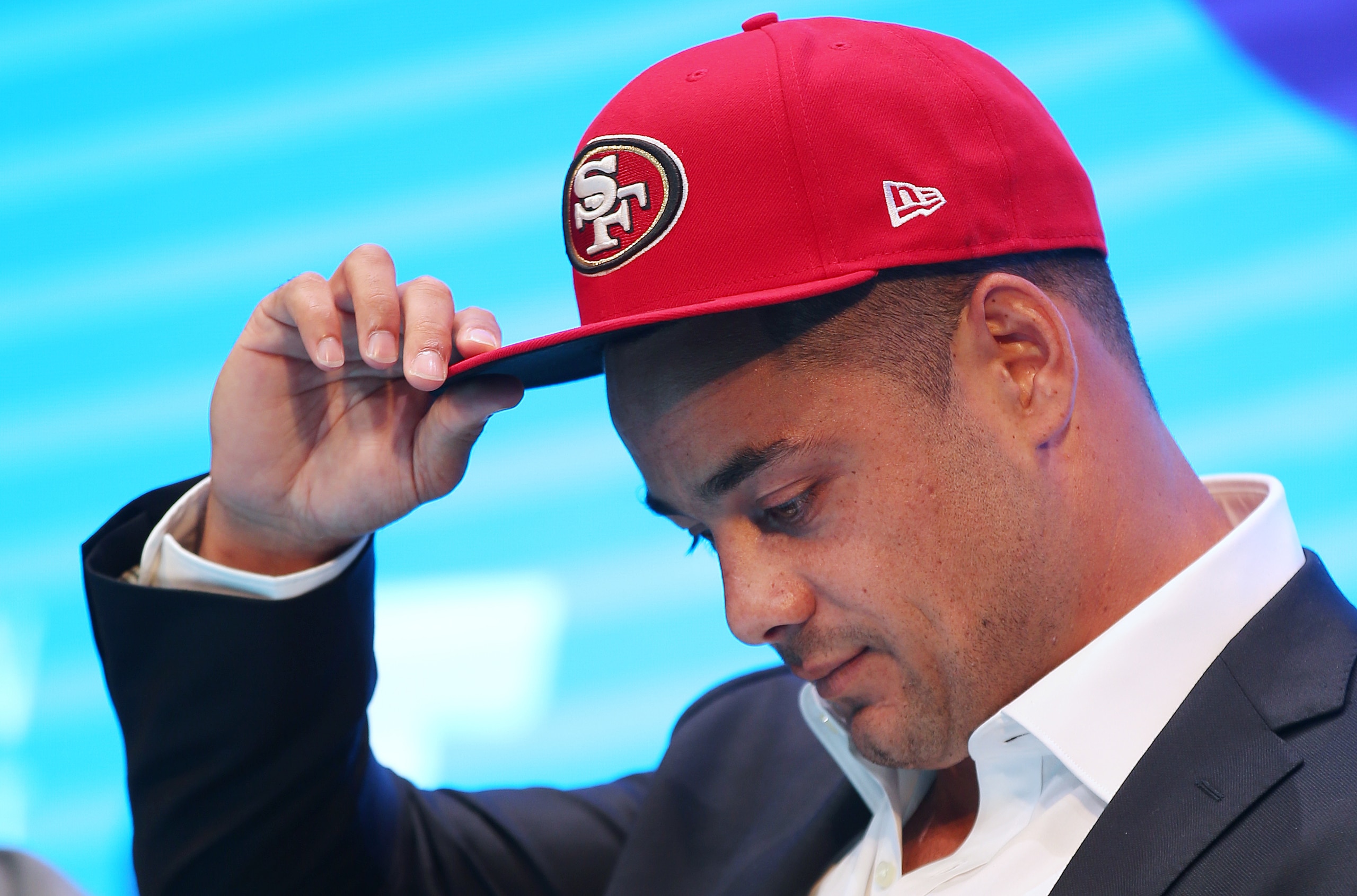 In this March 3, 2015 photo, Jarryd Hayne announces his free agent contract with the National Football League team the San Francisco 49ers at a press conference in Sydney. Less than three months after quitting the San Francisco 49ers to make an ill-fated attempt to compete in rugby sevens at the Rio Olympics, Jarryd Hayne is back in the Australian National Rugby League. (AP Photo/Rick Rycroft)
