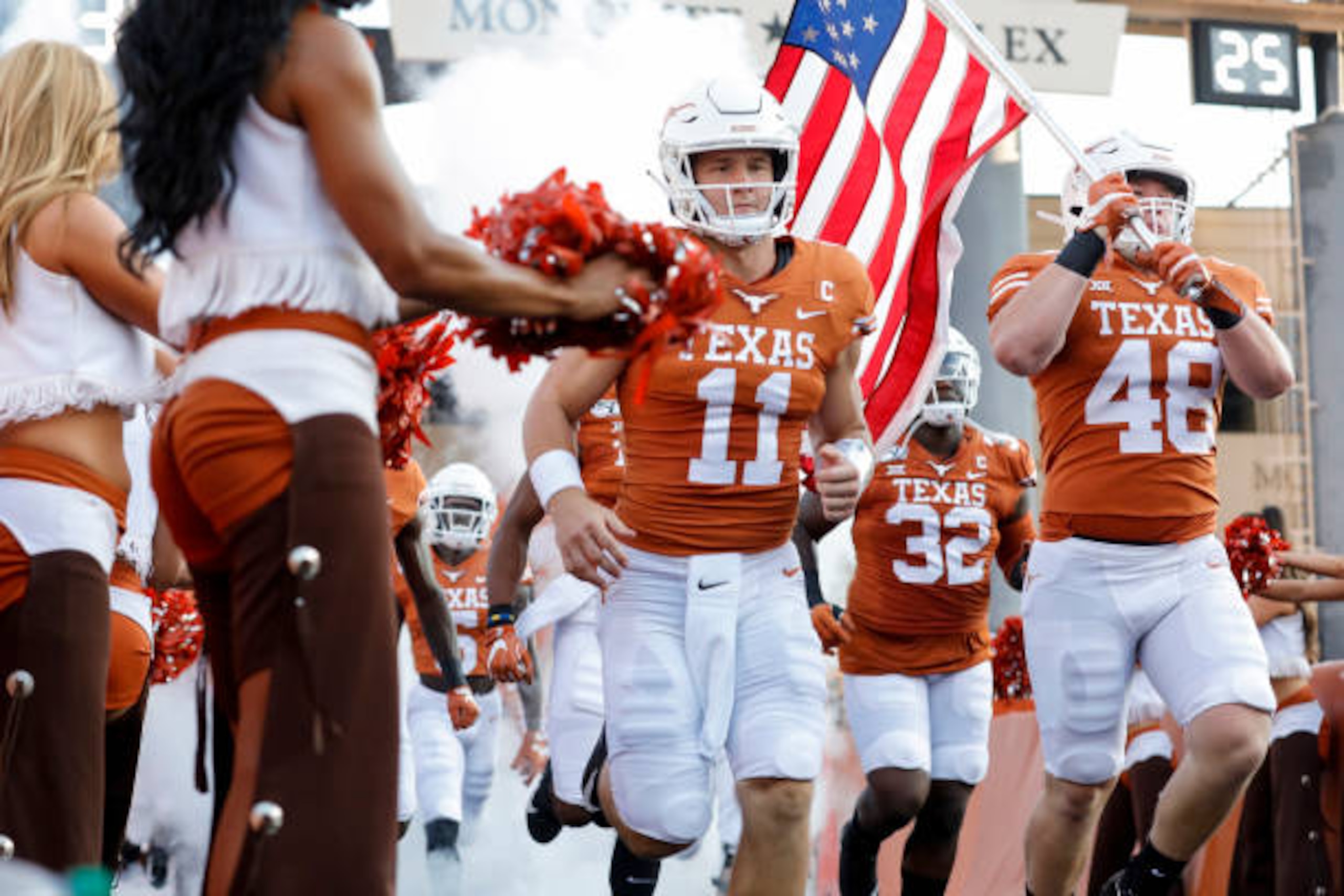 AUSTIN, TX - AUGUST 31:  Sam Ehlinger #11 of the Texas Longhorns and Jake Ehlinger #48 run onto the field before the game against the Louisiana Tech Bulldogs at Darrell K Royal-Texas Memorial Stadium on August 31, 2019 in Austin, Texas.  (Photo by Tim Warner/Getty Images)