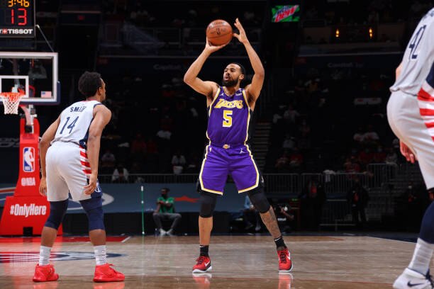 WASHINGTON, DC -  APRIL 28: Talen Horton-Tucker #5 of the Los Angeles Lakers shoots the ball during the game against the Washington Wizards on April 28, 2021 at Capital One Arena in Washington, DC. NOTE TO USER: User expressly acknowledges and agrees that, by downloading and or using this Photograph, user is consenting to the terms and conditions of the Getty Images License Agreement. Mandatory Copyright Notice: Copyright 2021 NBAE (Photo by Ned Dishman/NBAE via Getty Images)