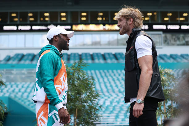 MIAMI GARDENS, FLORIDA - MAY 06:  Floyd Mayweather and Logan Paul face off during media availability prior to their June 6 match at Hard Rock Stadium on May 06, 2021 in Miami Gardens, Florida. (Photo by Cliff Hawkins/Getty Images)