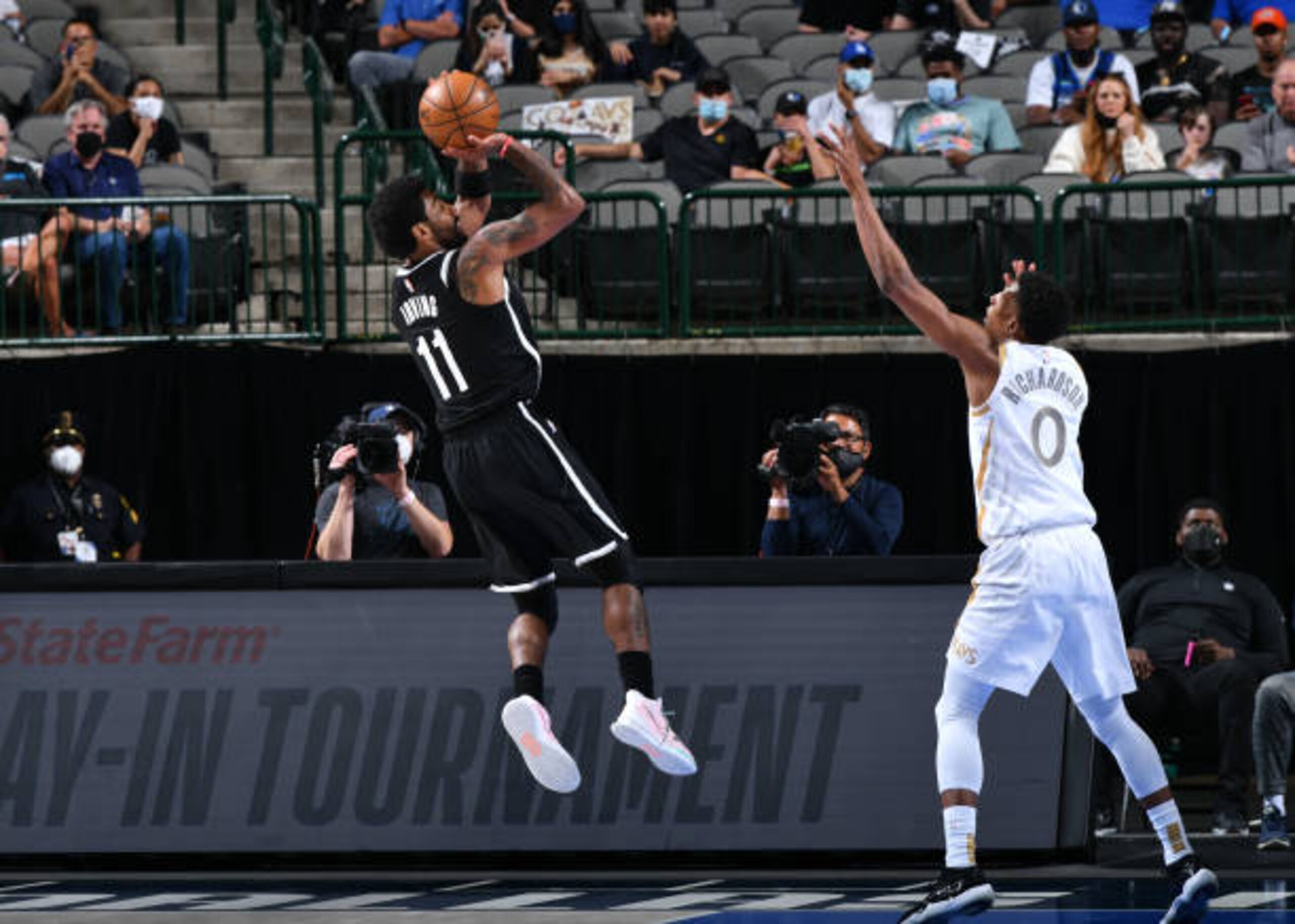 DALLAS, TX - MAY 6: Kyrie Irving #11 of the Brooklyn Nets shoots the ball during the game against the Dallas Mavericks on May 6, 2021 at the American Airlines Center in Dallas, Texas. NOTE TO USER: User expressly acknowledges and agrees that, by downloading and or using this photograph, User is consenting to the terms and conditions of the Getty Images License Agreement. Mandatory Copyright Notice: Copyright 2021 NBAE (Photo by Glenn James/NBAE via Getty Images) DALLAS, TX - MAY 6: Kyrie Irving #11 of the Brooklyn Nets shoots the ball during the game against the Dallas Mavericks on May 6, 2021 at the American Airlines Center in Dallas, Texas. NOTE TO USER: User expressly acknowledges and agrees that, by downloading and or using this photograph, User is consenting to the terms and conditions of the Getty Images License Agreement. Mandatory Copyright Notice: Copyright 2021 NBAE (Photo by Glenn James/NBAE via Getty Images)