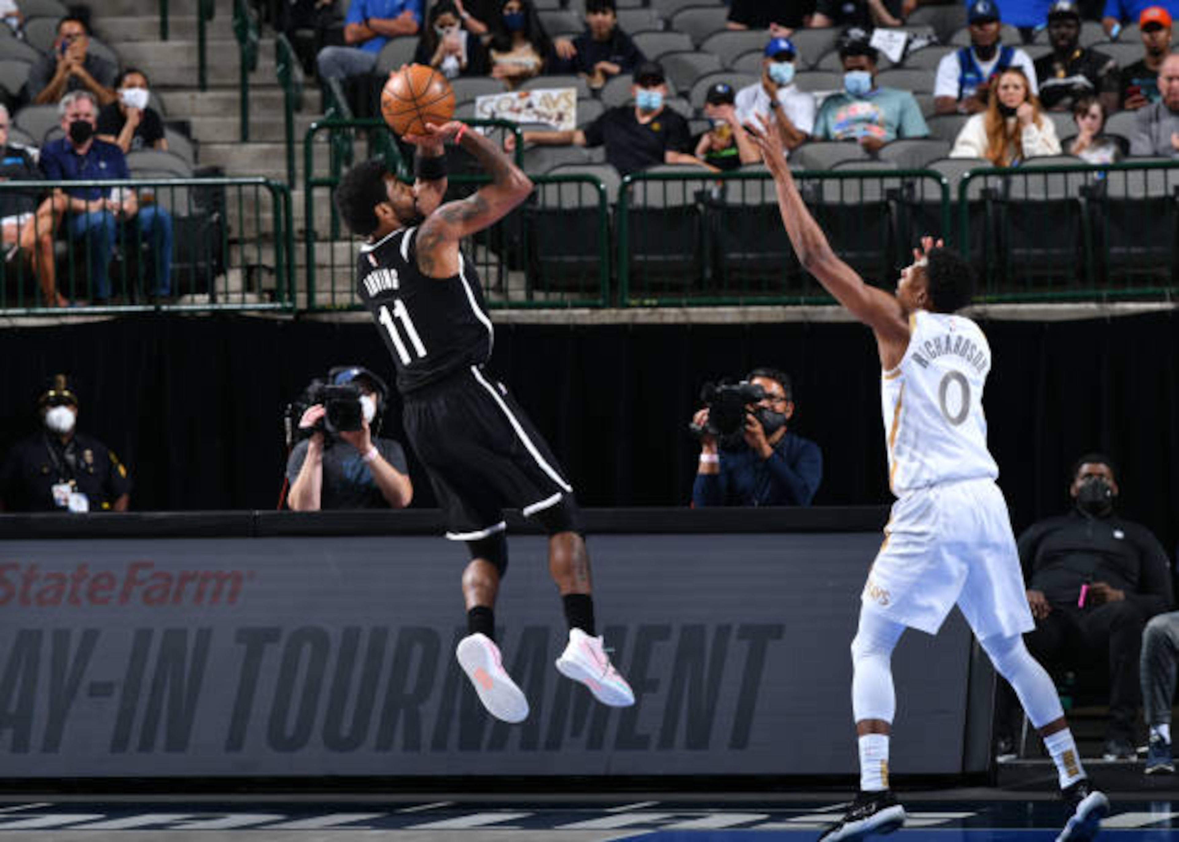 DALLAS, TX - MAY 6: Kyrie Irving #11 of the Brooklyn Nets shoots the ball during the game against the Dallas Mavericks on May 6, 2021 at the American Airlines Center in Dallas, Texas. NOTE TO USER: User expressly acknowledges and agrees that, by downloading and or using this photograph, User is consenting to the terms and conditions of the Getty Images License Agreement. Mandatory Copyright Notice: Copyright 2021 NBAE (Photo by Glenn James/NBAE via Getty Images)