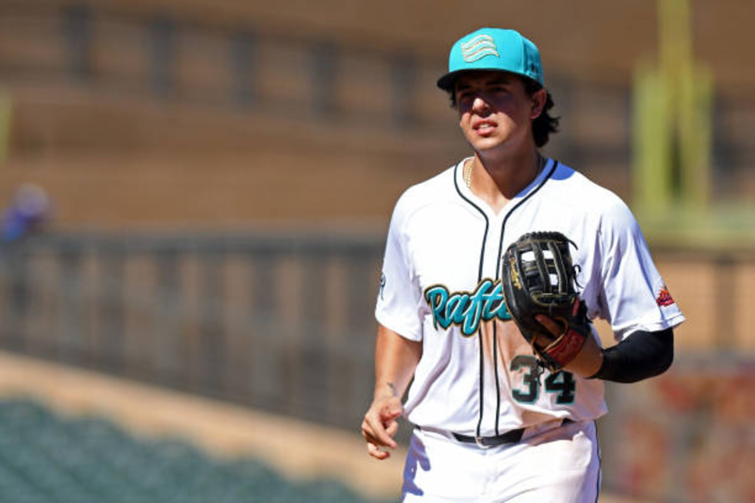 SCOTTSDALE, AZ - OCTOBER 02: Colton Welker #34 of the Salt River Rafters heads into the dugout during the game against the Scottsdale Scorpions at Salt River Fields at Talking Stick on Wednesday, October 2, 2019 in Scottsdale, Arizona. (Photo by Buck Davidson/MLB Photos via Getty Images)