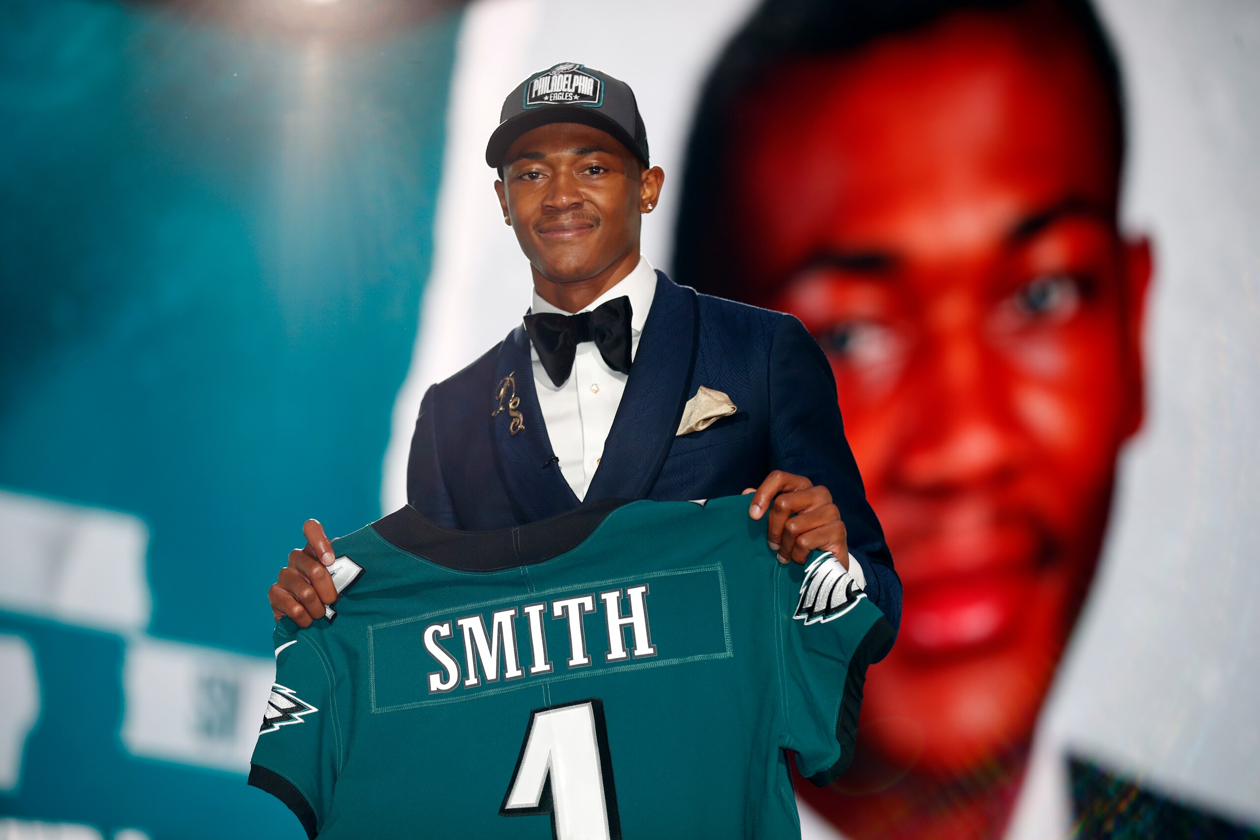 Alabama wide receiver DeVonta Smith holds a team jersey after he was chosen by the Philadelphia Eagles with the 10th pick in the first round of the NFL football draft Thursday April 29, 2021, in Cleveland. (Jeff Haynes/AP Images for Panini)