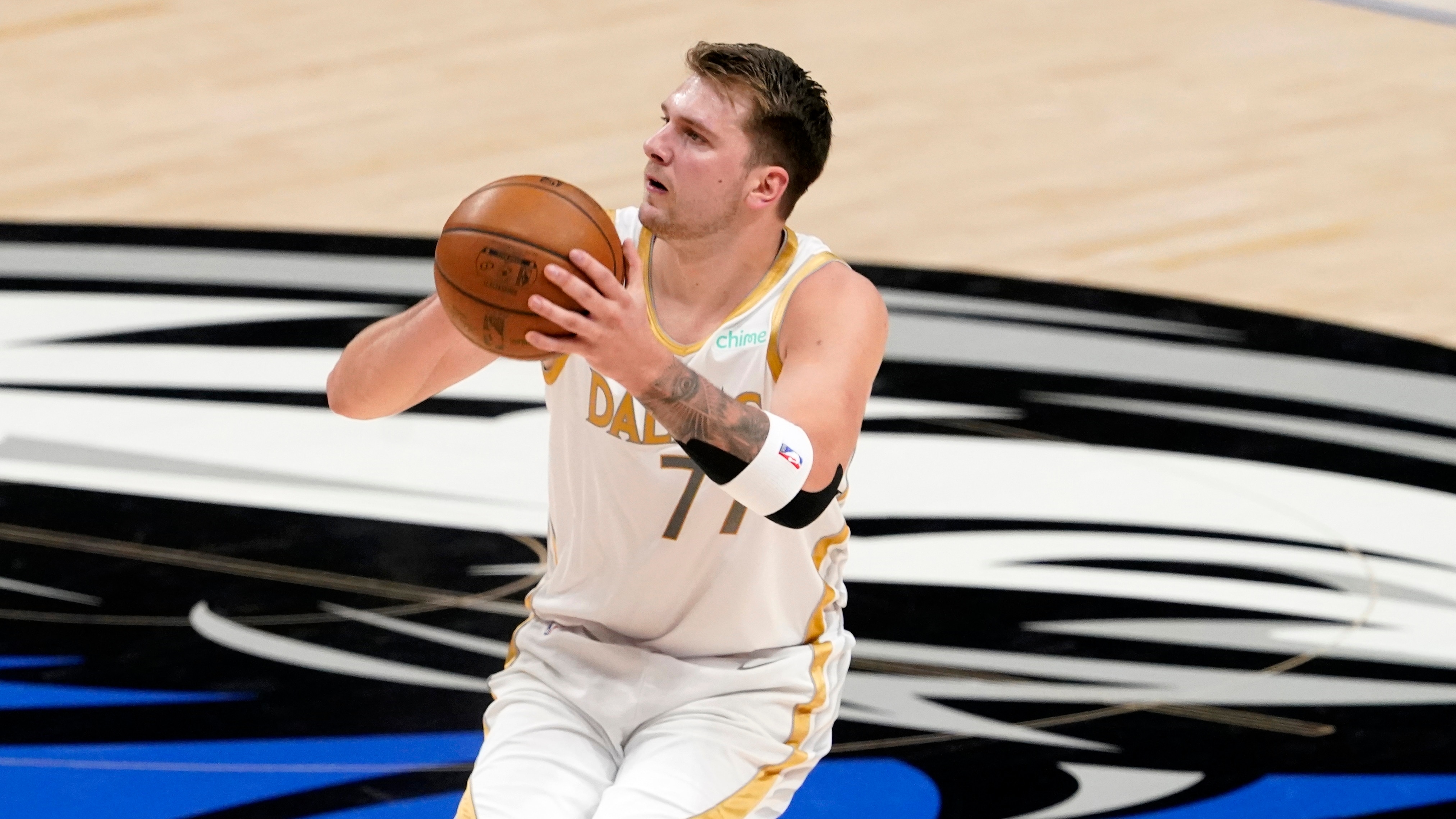Dallas Mavericks' Luka Doncic attempts as shot during an NBA basketball game against the Brooklyn Nets in Dallas, Thursday, May 6, 2021. (AP Photo/Tony Gutierrez)