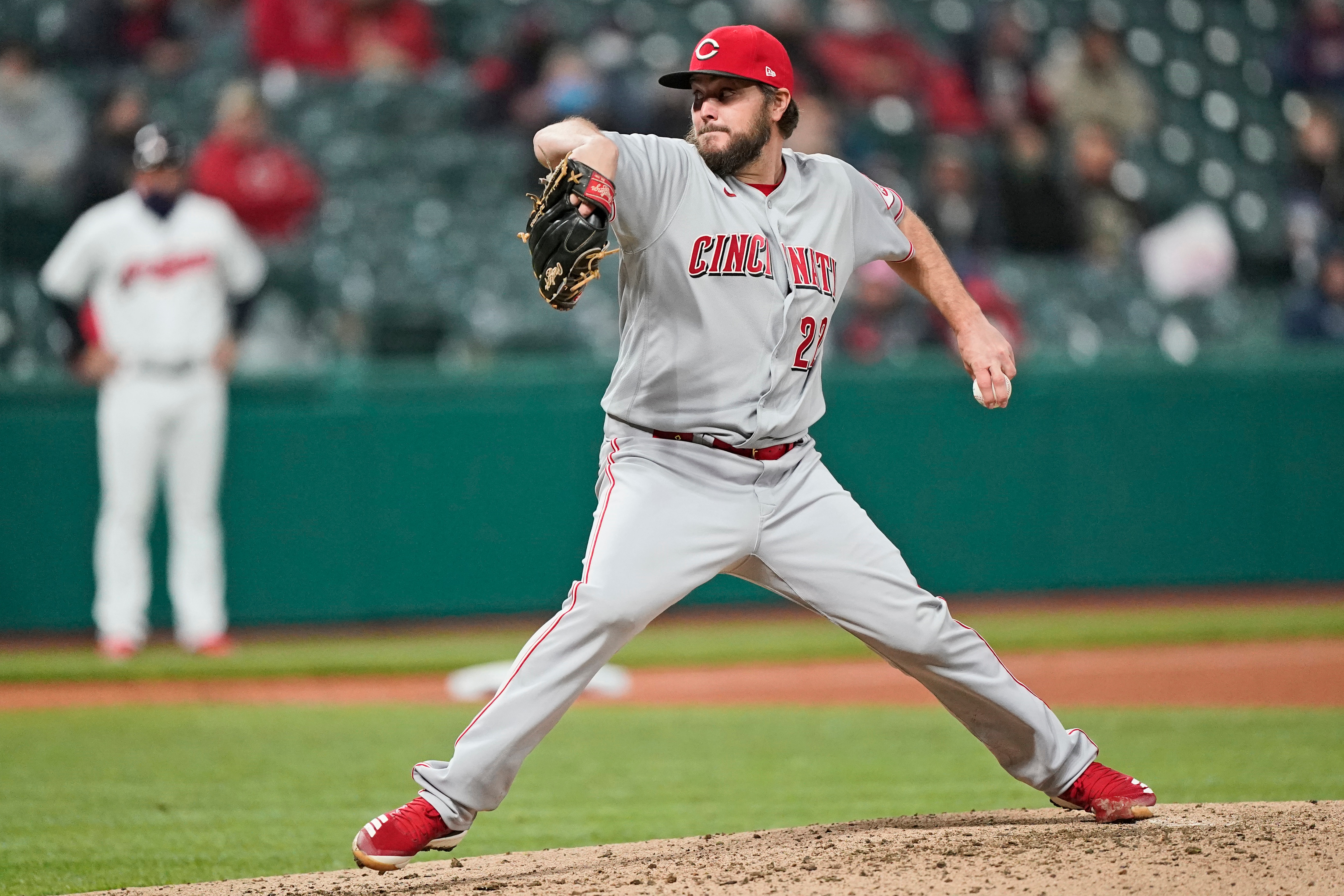 Cincinnati Reds starting pitcher Wade Miley delivers in the sixth inning of a baseball game against the Cleveland Indians, Friday, May 7, 2021, in Cleveland. (AP Photo/Tony Dejak)