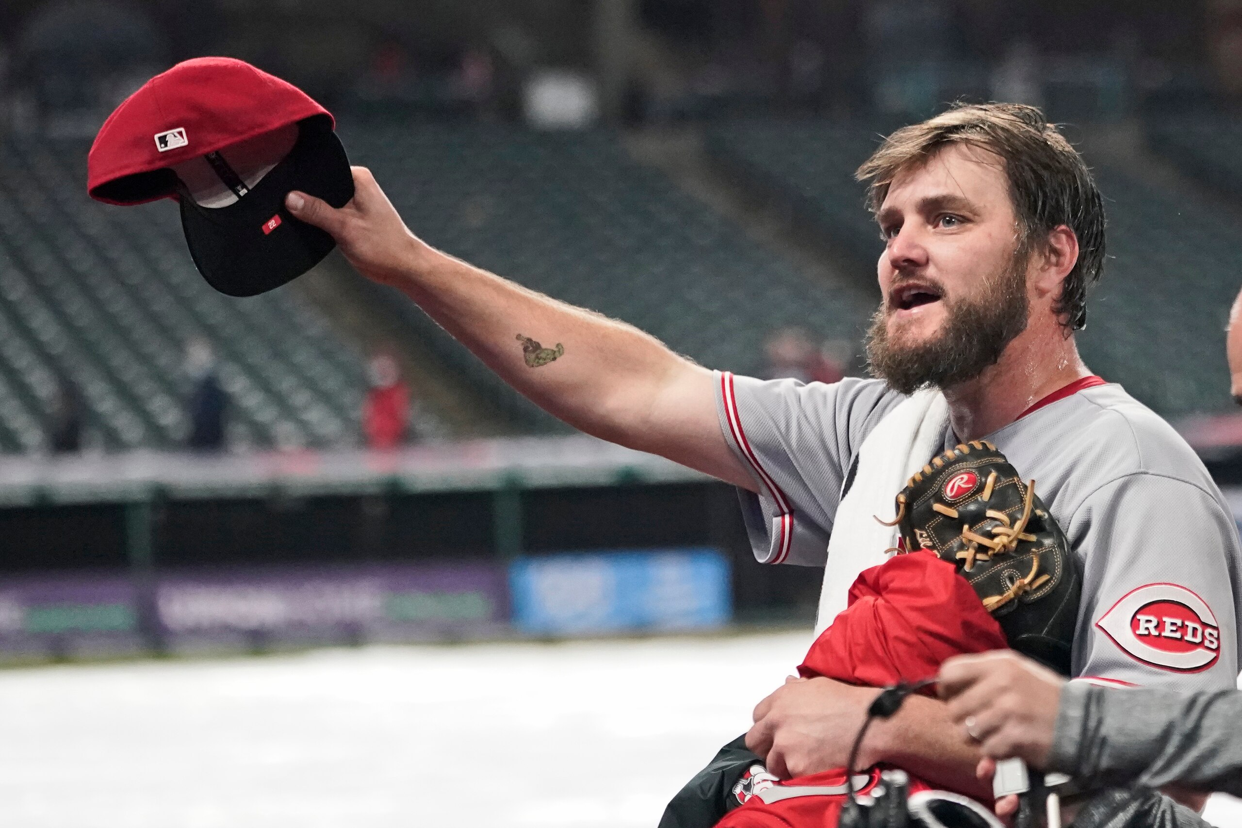 Cincinnati Reds starting pitcher Wade Miley tips his cap to fans after pitching a no-hitter against the Cleveland Indians in a baseball game, Friday, May 7, 2021, in Cleveland. (AP Photo/Tony Dejak) Cincinnati Reds starting pitcher Wade Miley tips his cap to fans after pitching a no-hitter against the Cleveland Indians in a baseball game, Friday, May 7, 2021, in Cleveland. (AP Photo/Tony Dejak)