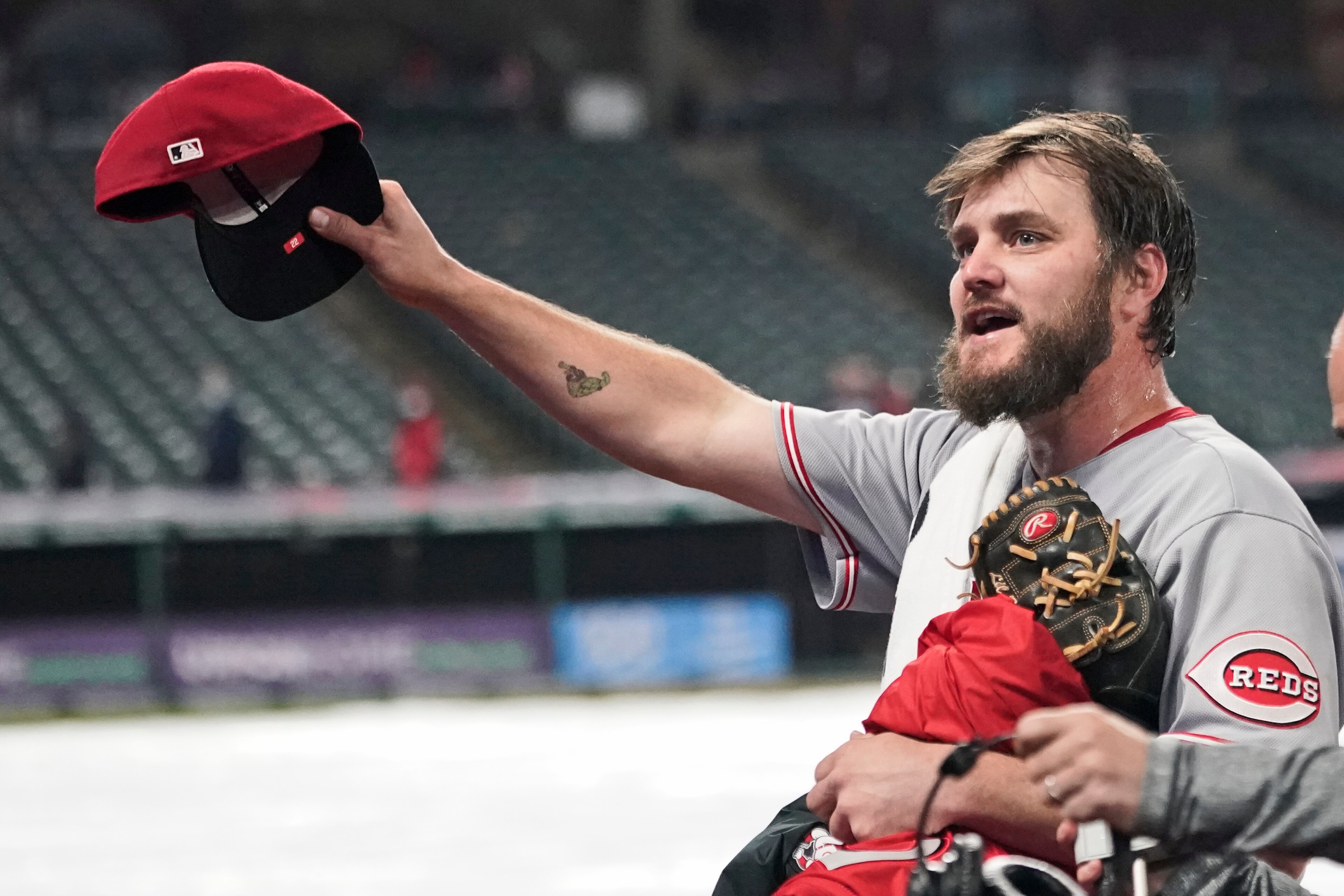 Cincinnati Reds starting pitcher Wade Miley tips his cap to fans after pitching a no-hitter against the Cleveland Indians in a baseball game, Friday, May 7, 2021, in Cleveland. (AP Photo/Tony Dejak) Cincinnati Reds starting pitcher Wade Miley tips his cap to fans after pitching a no-hitter against the Cleveland Indians in a baseball game, Friday, May 7, 2021, in Cleveland. (AP Photo/Tony Dejak)