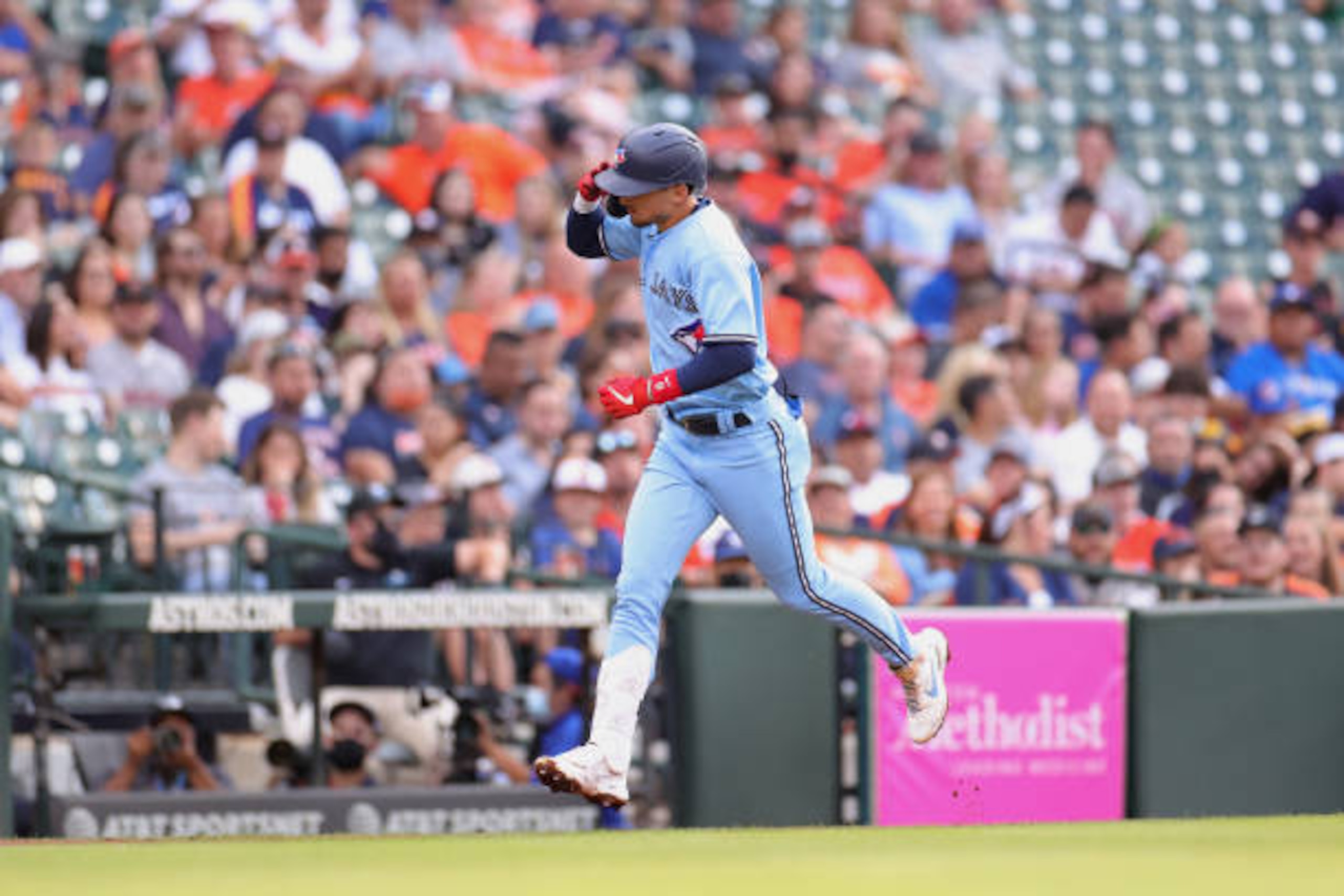 HOUSTON, TEXAS - MAY 08: Cavan Biggio #8 of the Toronto Blue Jays hits a two run home run during the second inning against the Houston Astros at Minute Maid Park on May 08, 2021 in Houston, Texas. (Photo by Carmen Mandato/Getty Images)