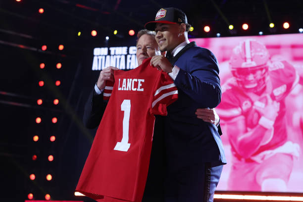 CLEVELAND, OHIO - APRIL 29: Trey Lance poses with NFL Commissioner Roger Goodell onstage after being selected third by the San Francisco 49ers during round one of the 2021 NFL Draft at the Great Lakes Science Center on April 29, 2021 in Cleveland, Ohio. (Photo by Gregory Shamus/Getty Images)