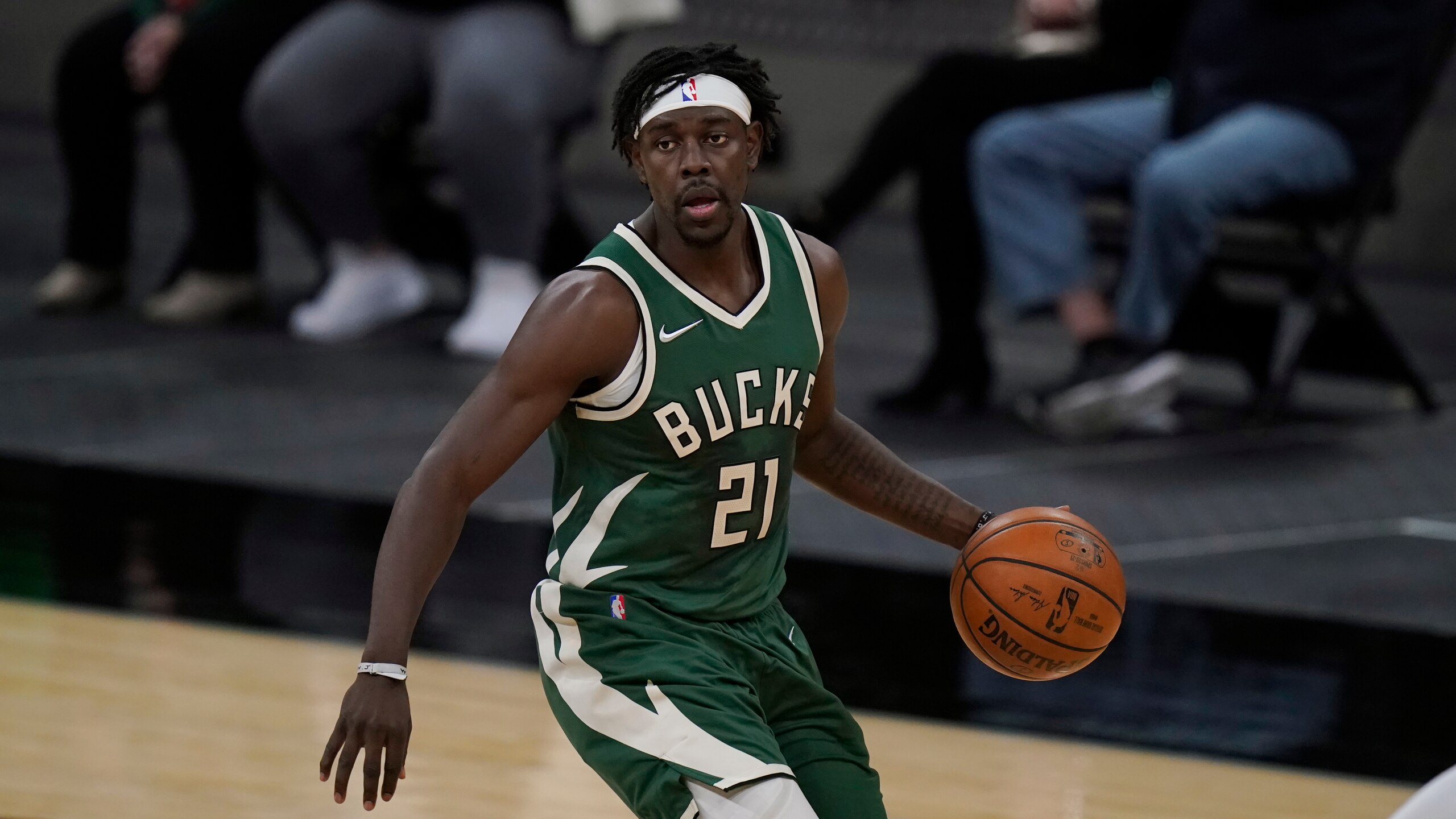 Milwaukee Bucks guard Jrue Holiday (21) during the first half of an NBA basketball game against the San Antonio Spurs in San Antonio, Monday, May 10, 2021. (AP Photo/Eric Gay)