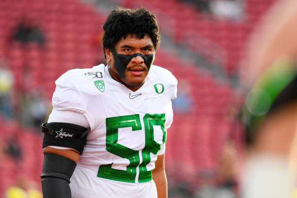LOS ANGELES, CA - NOVEMBER 02: Oregon Ducks offensive line Penei Sewell (58) looks on before a college football game between the Oregon Ducks and the USC Trojans on November 2, 2019, at Los Angeles Memorial Coliseum in Los Angeles, CA. (Photo by Brian Rothmuller/Icon Sportswire via Getty Images)