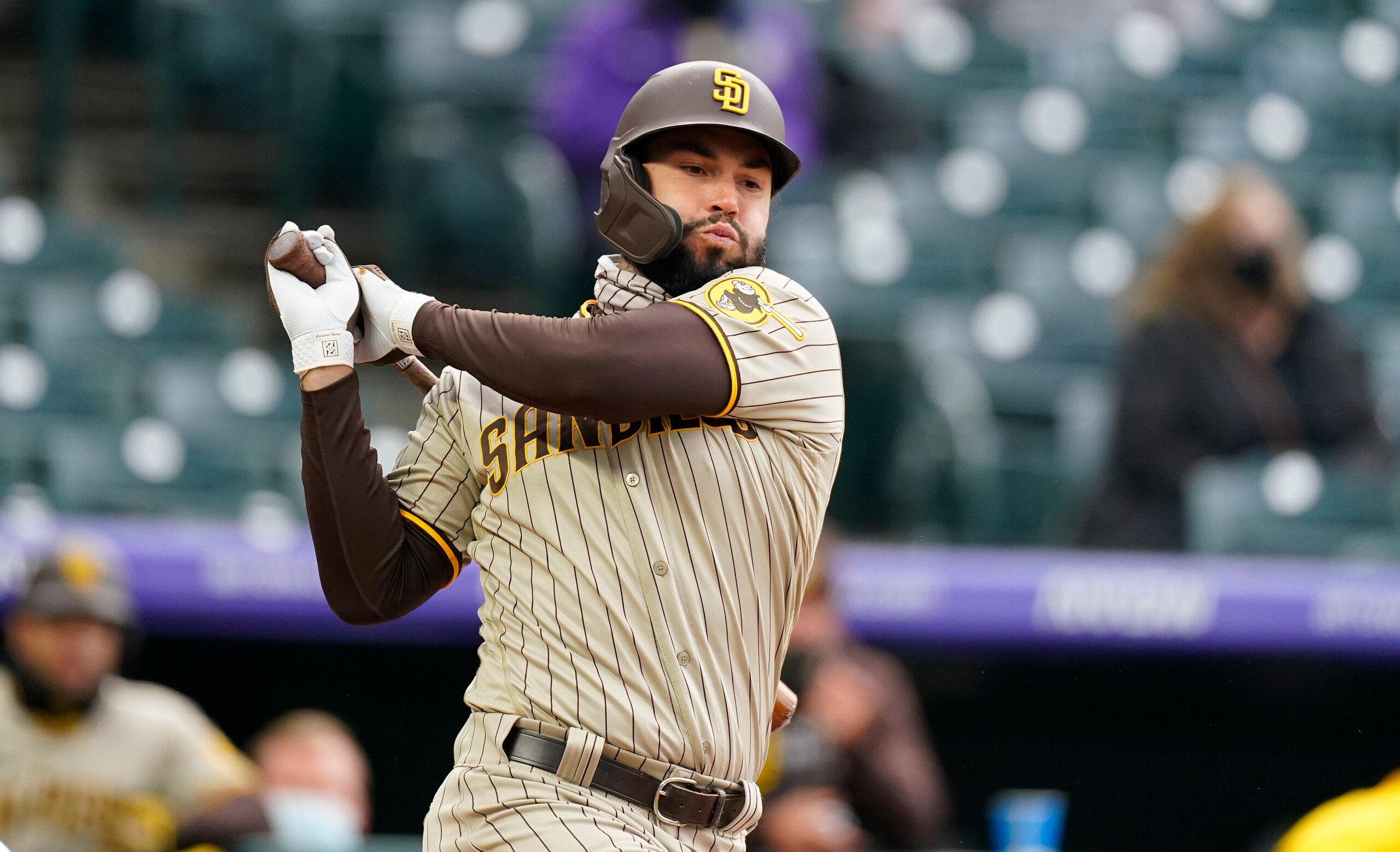San Diego Padres first baseman Eric Hosmer (30) in the first inning of a baseball game Tuesday, May 11, 2021, in Denver. (AP Photo/David Zalubowski)