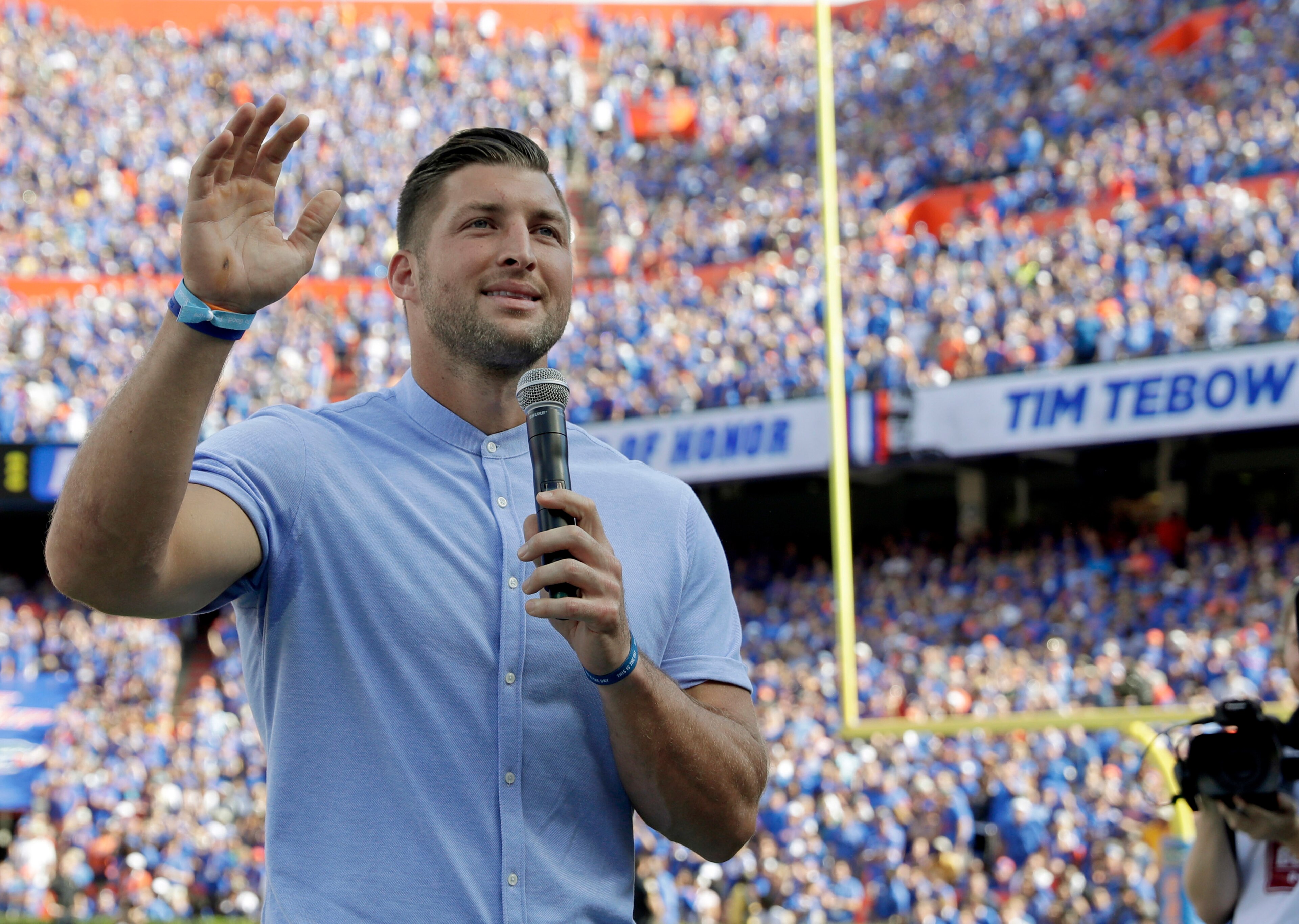 FILE - Former Florida football player Tim Tebow speaks to fans after he was inducted in the Ring of Honor at Florida Field during the first half of an NCAA college football game against LSU in Gainesville, Fla., in this Saturday, Oct. 6, 2018, file photo. Tebow and Urban Meyer are apparently getting back together, this time in the NFL. The former Florida star and 2007 Heisman Trophy-winning quarterback is expected to team up with his college coach by signing a one-year contract to play for the Jacksonville Jaguars, the NFL Network reported Monday, May 10, 2021. (AP Photo/John Raoux, File) FILE - Former Florida football player Tim Tebow speaks to fans after he was inducted in the Ring of Honor at Florida Field during the first half of an NCAA college football game against LSU in Gainesville, Fla., in this Saturday, Oct. 6, 2018, file photo. Tebow and Urban Meyer are apparently getting back together, this time in the NFL. The former Florida star and 2007 Heisman Trophy-winning quarterback is expected to team up with his college coach by signing a one-year contract to play for the Jacksonville Jaguars, the NFL Network reported Monday, May 10, 2021. (AP Photo/John Raoux, File)