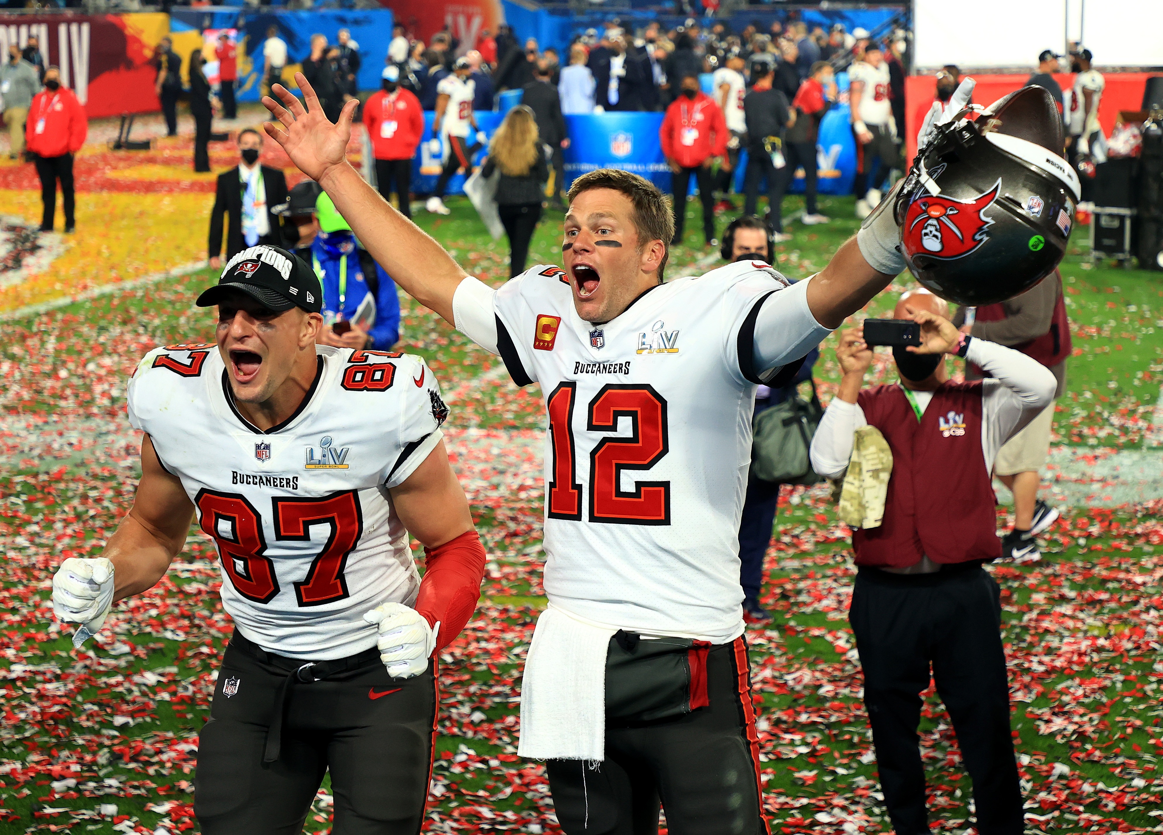 TAMPA, FLORIDA - FEBRUARY 07: Rob Gronkowski #87 and Tom Brady #12 of the Tampa Bay Buccaneers celebrate after defeating the Kansas City Chiefs in Super Bowl LV at Raymond James Stadium on February 07, 2021 in Tampa, Florida. The Buccaneers defeated the Chiefs 31-9. (Photo by Mike Ehrmann/Getty Images) TAMPA, FLORIDA - FEBRUARY 07: Rob Gronkowski #87 and Tom Brady #12 of the Tampa Bay Buccaneers celebrate after defeating the Kansas City Chiefs in Super Bowl LV at Raymond James Stadium on February 07, 2021 in Tampa, Florida. The Buccaneers defeated the Chiefs 31-9. (Photo by Mike Ehrmann/Getty Images)