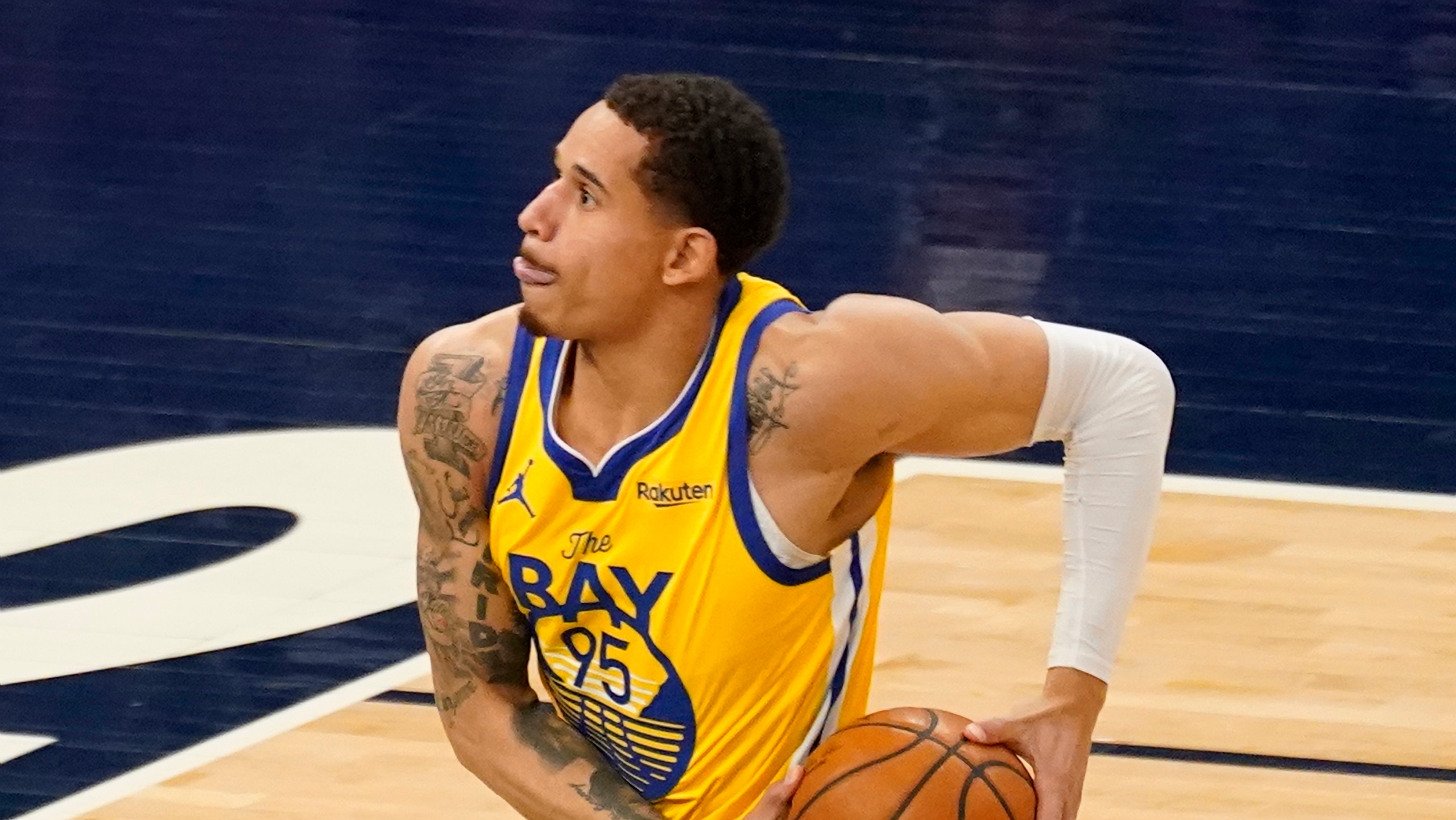 Golden State Warriors' Juan Toscano-Anderson (95) plays against the Minnesota Timberwolves in an NBA basketball game, Thursday, April 29, 2021, in Minneapolis. (AP Photo/Jim Mone) Golden State Warriors' Juan Toscano-Anderson (95) plays against the Minnesota Timberwolves in an NBA basketball game, Thursday, April 29, 2021, in Minneapolis. (AP Photo/Jim Mone)