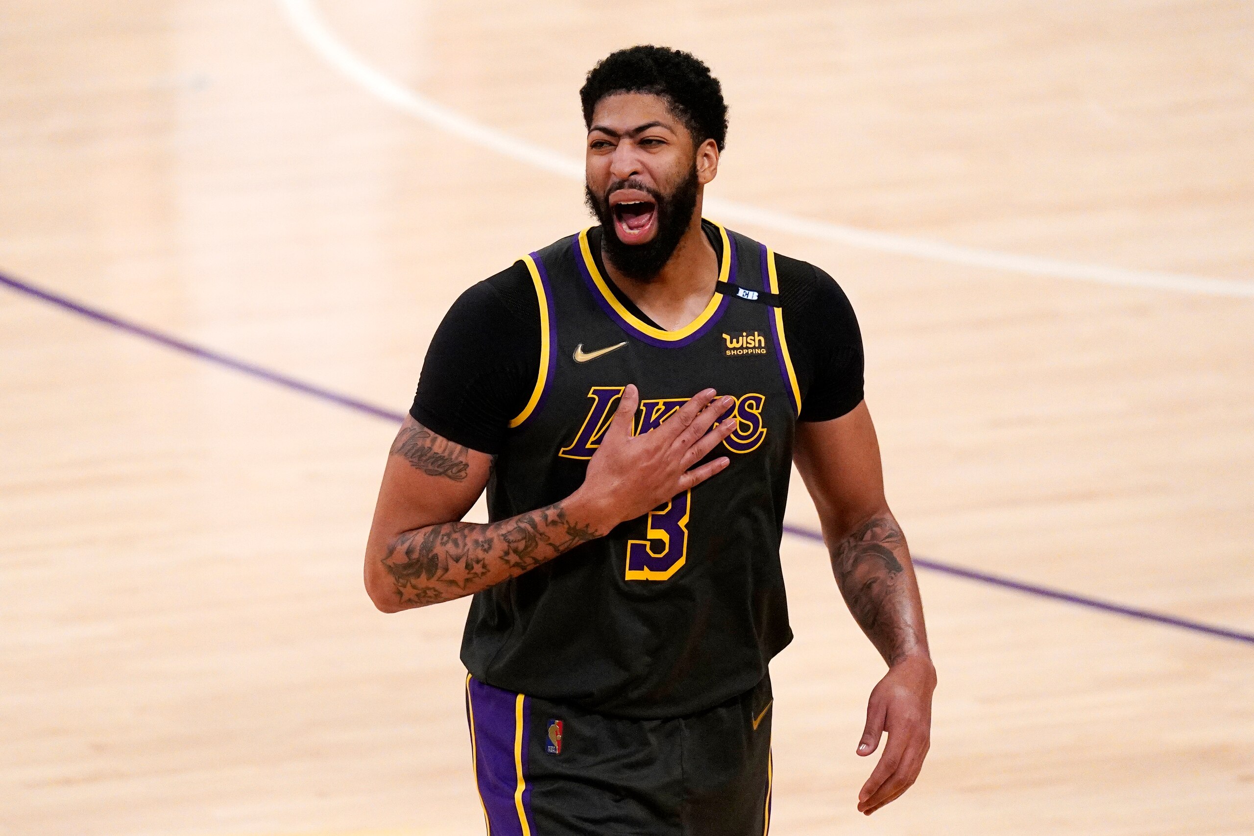 Los Angeles Lakers forward Anthony Davis celebrates after the Lakers defeated the Denver Nuggets 93-89 in a NBA basketball game Monday, May 3, 2021, in Los Angeles. (AP Photo/Mark J. Terrill)