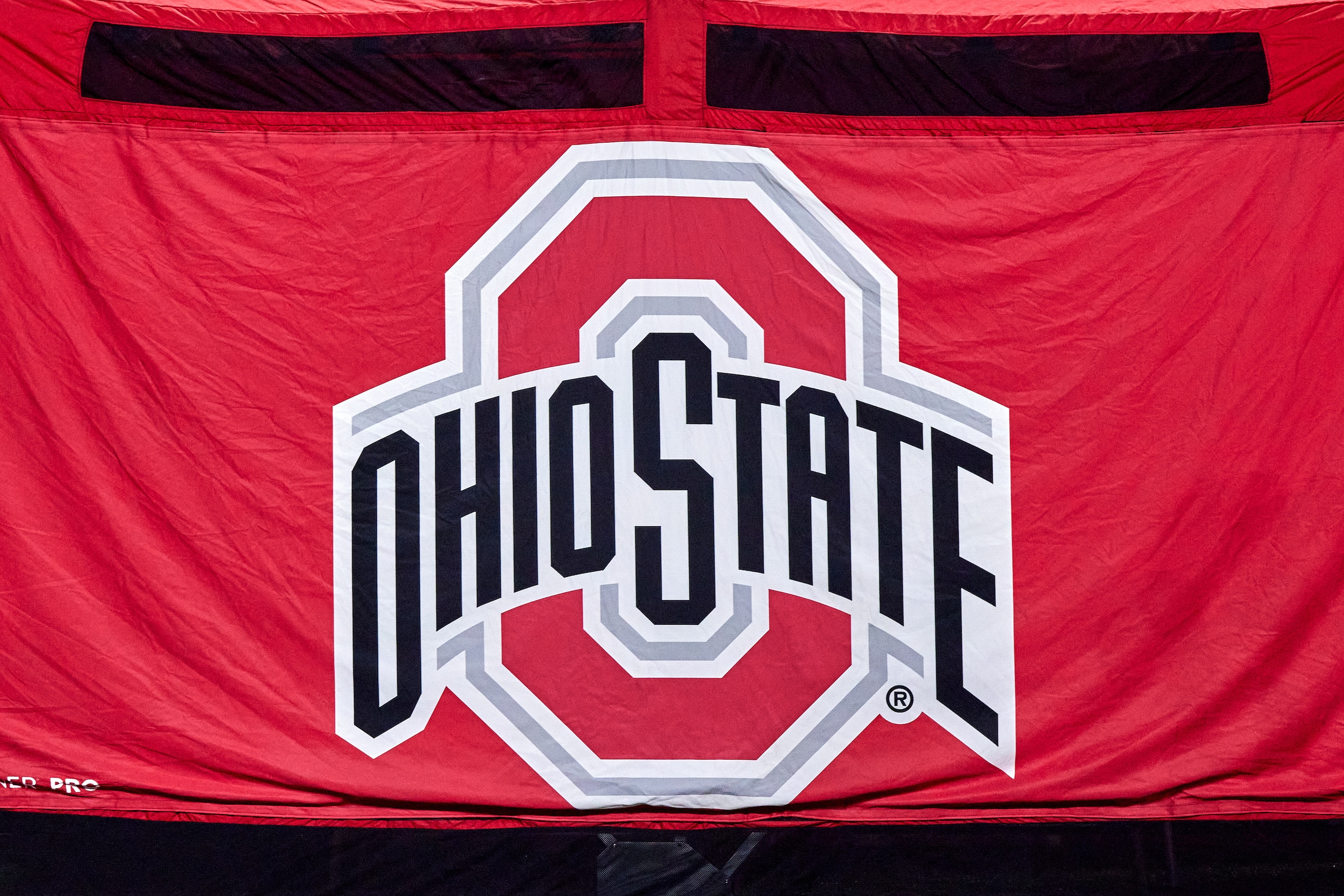 INDIANAPOLIS, IN - DECEMBER 19: A detail view of the
Ohio State Buckeyes logo is seen on the back of the medical tent in action during the Big Ten Championship game between the Ohio State Buckeyes and the Northwestern Wildcats on December 19, 2020 at Lucas Oil stadium, in Indianapolis, IN. (Photo by Robin Alam/Icon Sportswire via Getty Images) INDIANAPOLIS, IN - DECEMBER 19: A detail view of the
Ohio State Buckeyes logo is seen on the back of the medical tent in action during the Big Ten Championship game between the Ohio State Buckeyes and the Northwestern Wildcats on December 19, 2020 at Lucas Oil stadium, in Indianapolis, IN. (Photo by Robin Alam/Icon Sportswire via Getty Images)