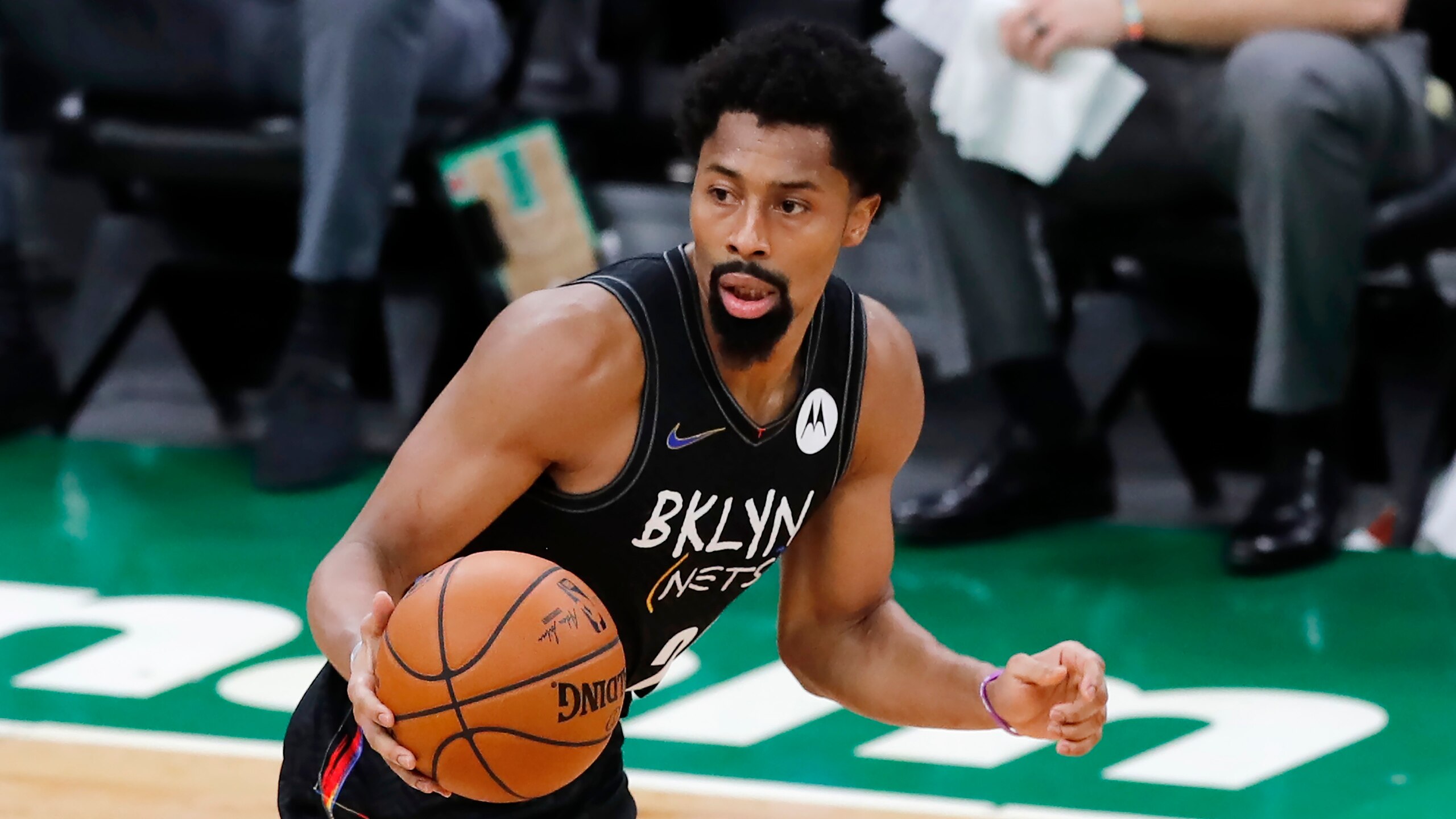 Brooklyn Nets' Spencer Dinwiddie plays against the Boston Celtics during the first half of an NBA basketball game, Friday, Dec. 25, 2020, in Boston. (AP Photo/Michael Dwyer)