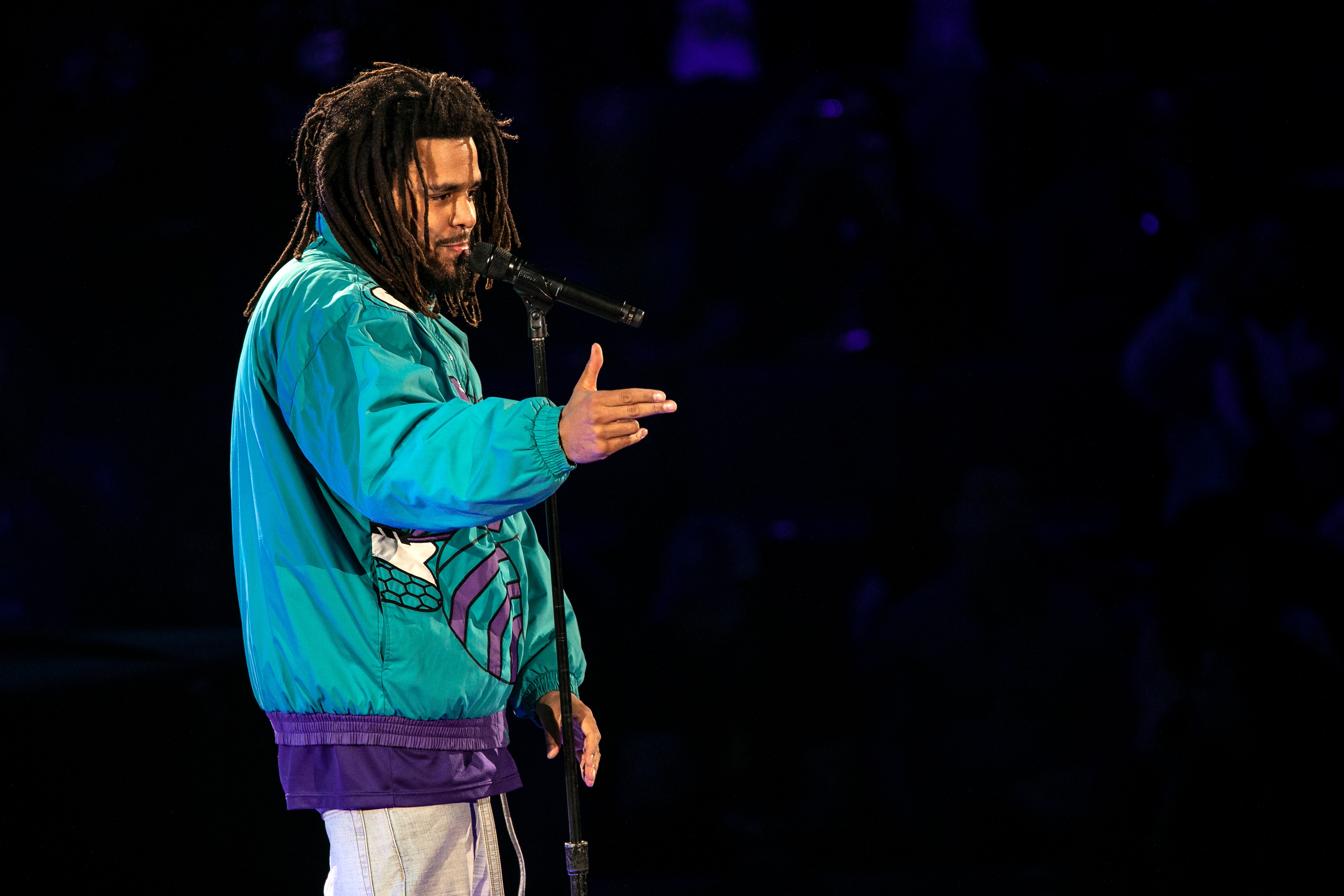 CHARLOTTE, NORTH CAROLINA - FEBRUARY 17: Rapper J. Cole performs during halftime of the 68th NBA All-Star Game  on February 17, 2019 in Charlotte, North Carolina. (Photo by Jeff Hahne/Getty Images)