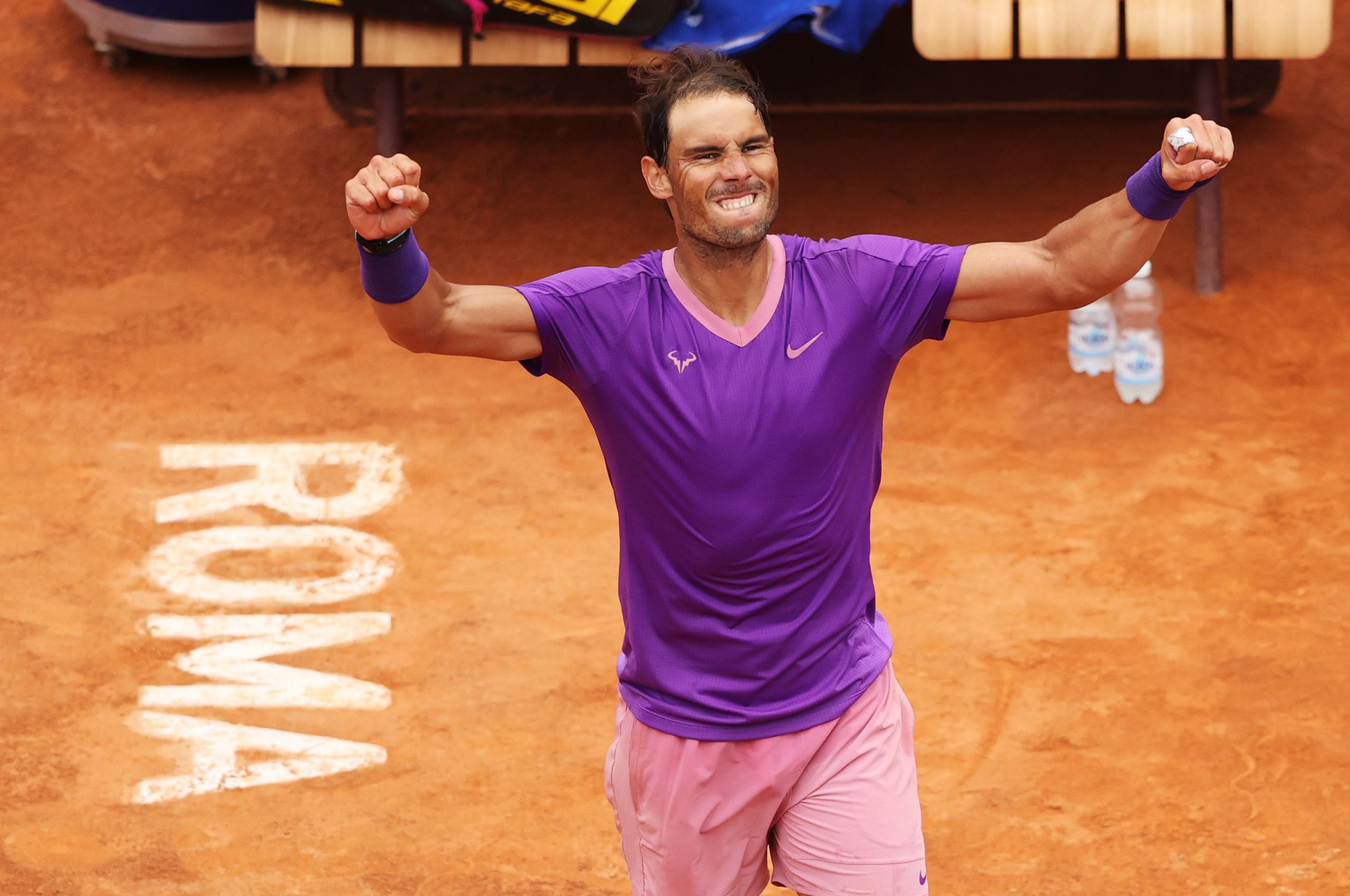 ROME, ITALY - MAY 14:  Rafael Nadal of Spain celebrates after defeating Alexander Zverev of Germany in their match on Day Seven of the Internazionali BNL D'Italia at Foro Italico on May 14, 2021 in Rome, Italy. Sporting stadiums around Italy remain under strict restrictions due to the Coronavirus Pandemic as Government social distancing laws prohibit fans inside venues resulting in games being played behind closed doors. (Photo by Clive Brunskill/Getty Images)
