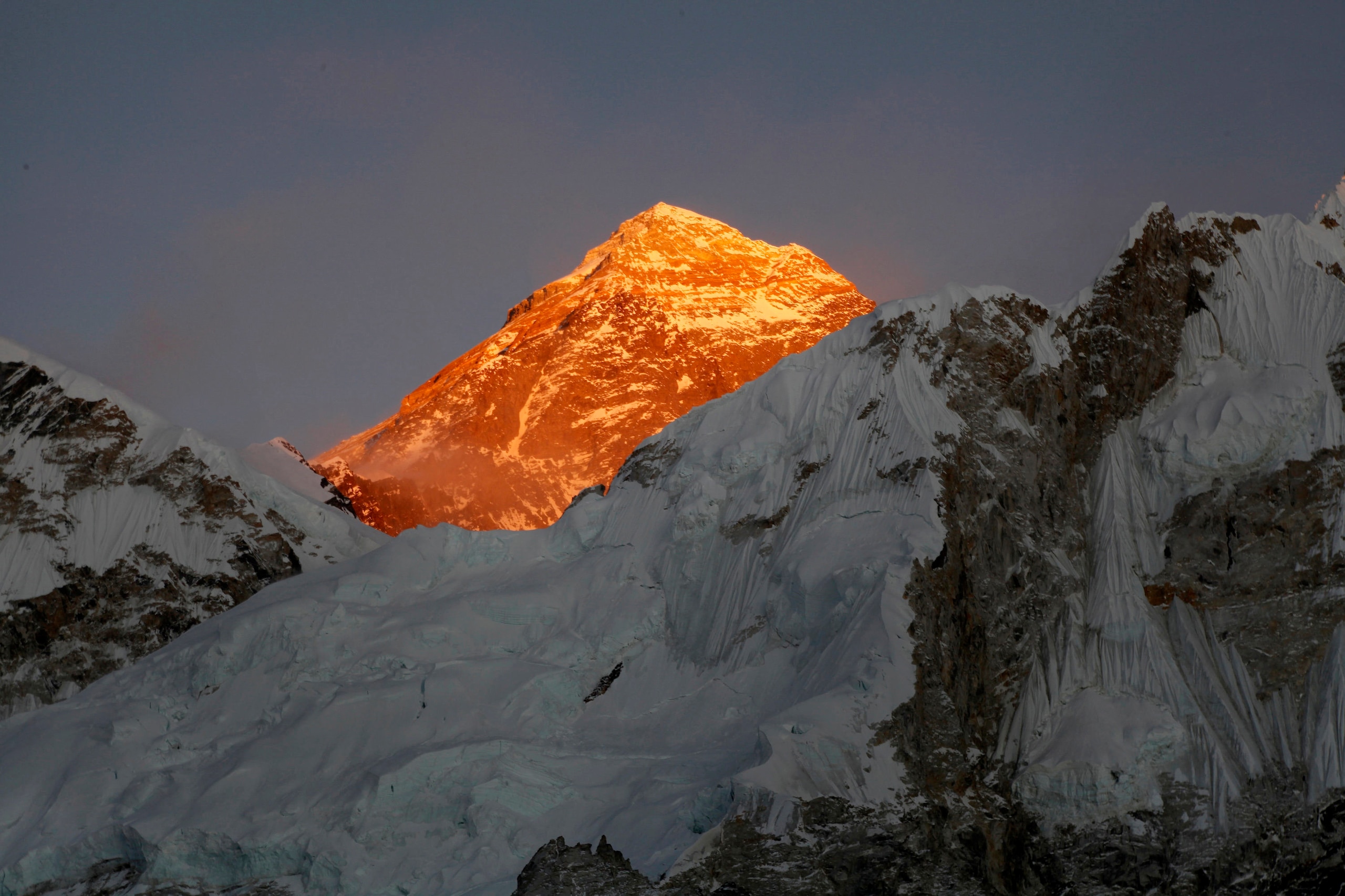 FILE - In this Nov. 12, 2015, file photo, Mt. Everest is seen from the route to Kalapatthar in Nepal. Climbers on Friday found the body of one of two Indians who went missing last week near the top of Mount Everest, while a helicopter brought back the body of an Australian woman who died on the mountain. Worsening weather was forcing everyone to descend to safety, with the last missing climber presumed dead. (AP Photo/Tashi Sherpa, File)