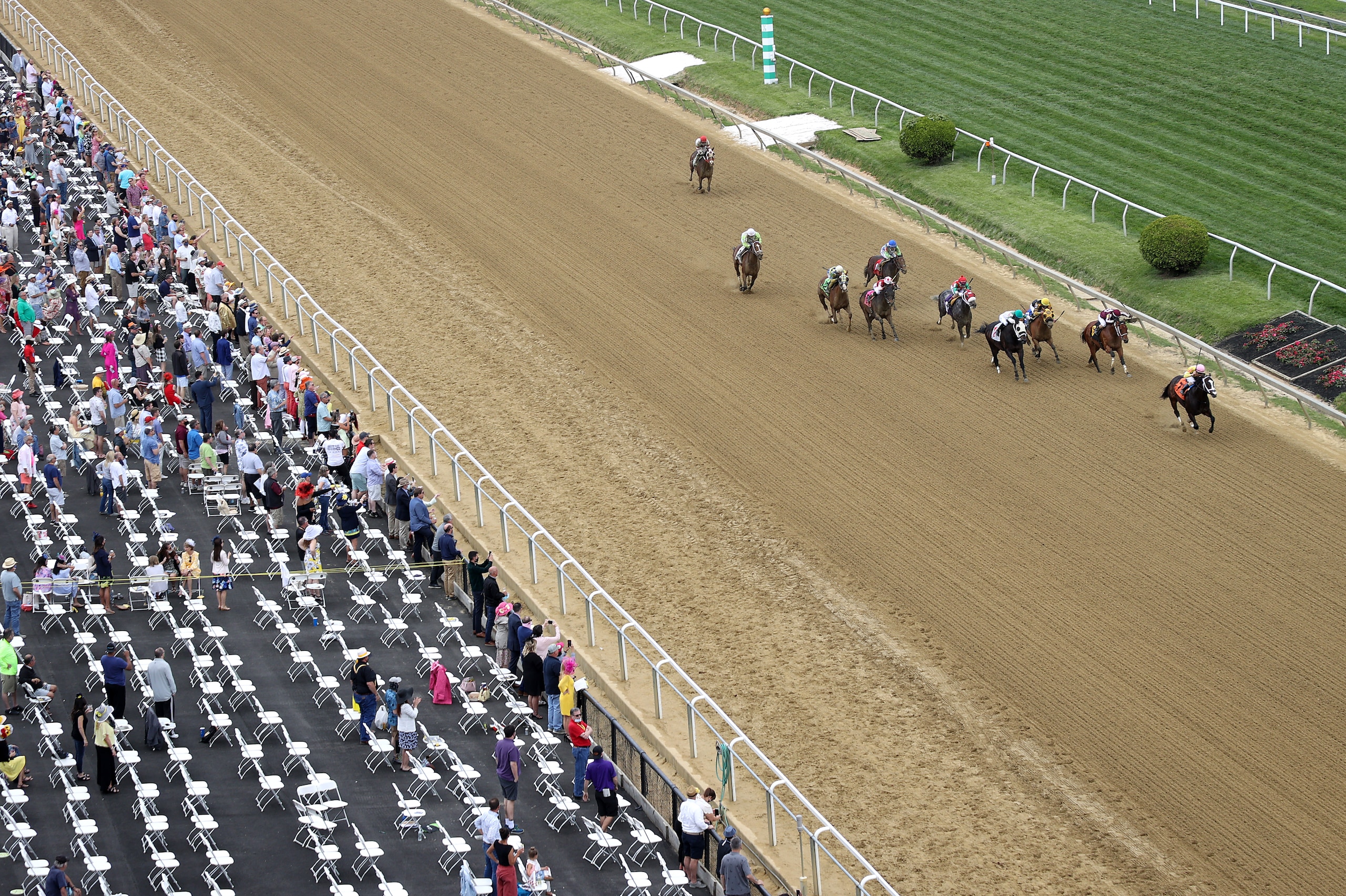 BALTIMORE, MARYLAND - MAY 14: The field heads to the finish line during the sixth race at Pimlico Race Course on May 14, 2021 in Baltimore, Maryland. The 146th running of the Preakness Stakes will be held Saturday. (Photo by Rob Carr/Getty Images)