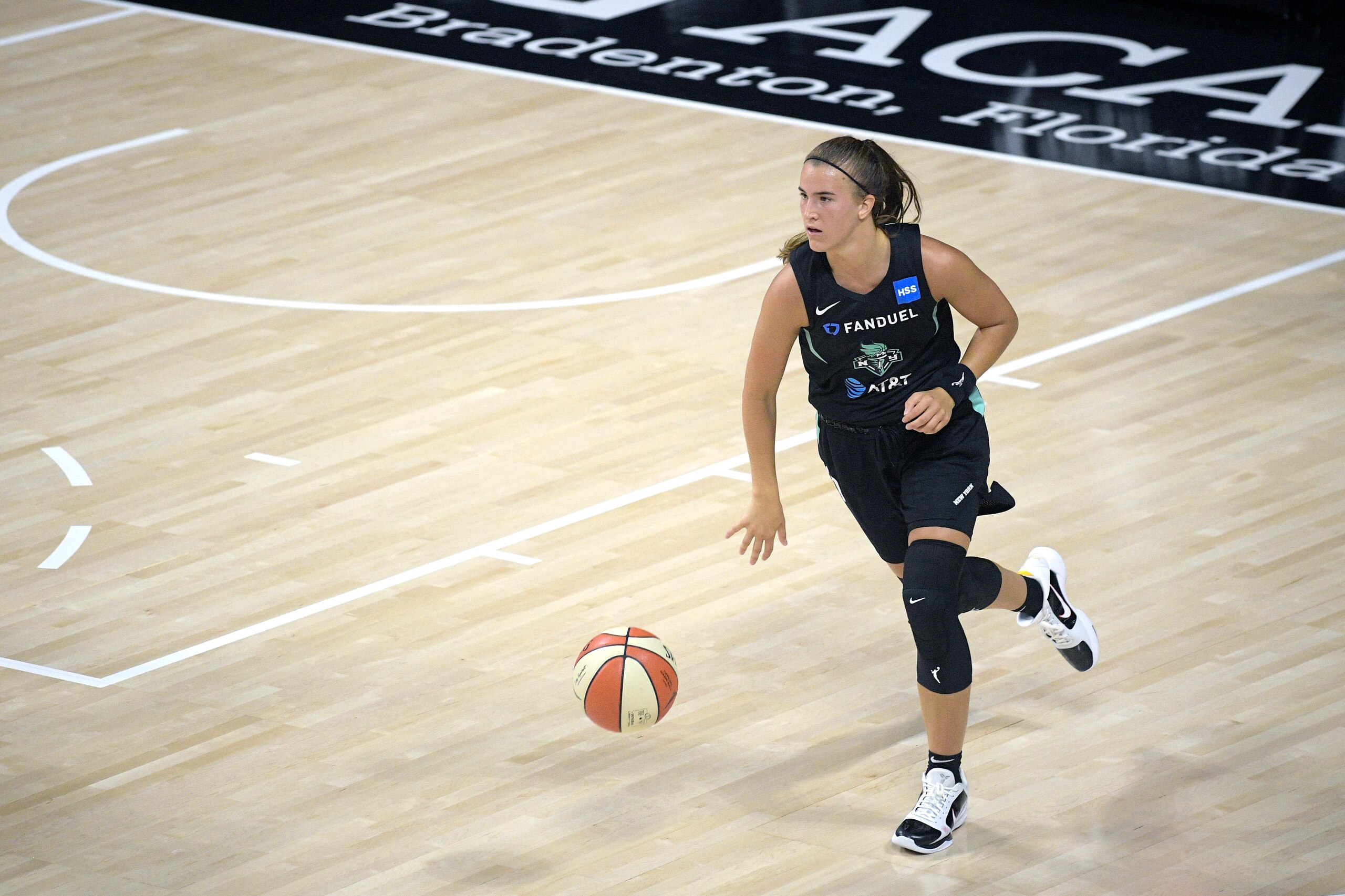 New York Liberty guard Sabrina Ionescu brings the ball up the court during the second half of a WNBA basketball game against the Seattle Storm, Saturday, July 25, 2020, in Bradenton, Fla. (AP Photo/Phelan M. Ebenhack)