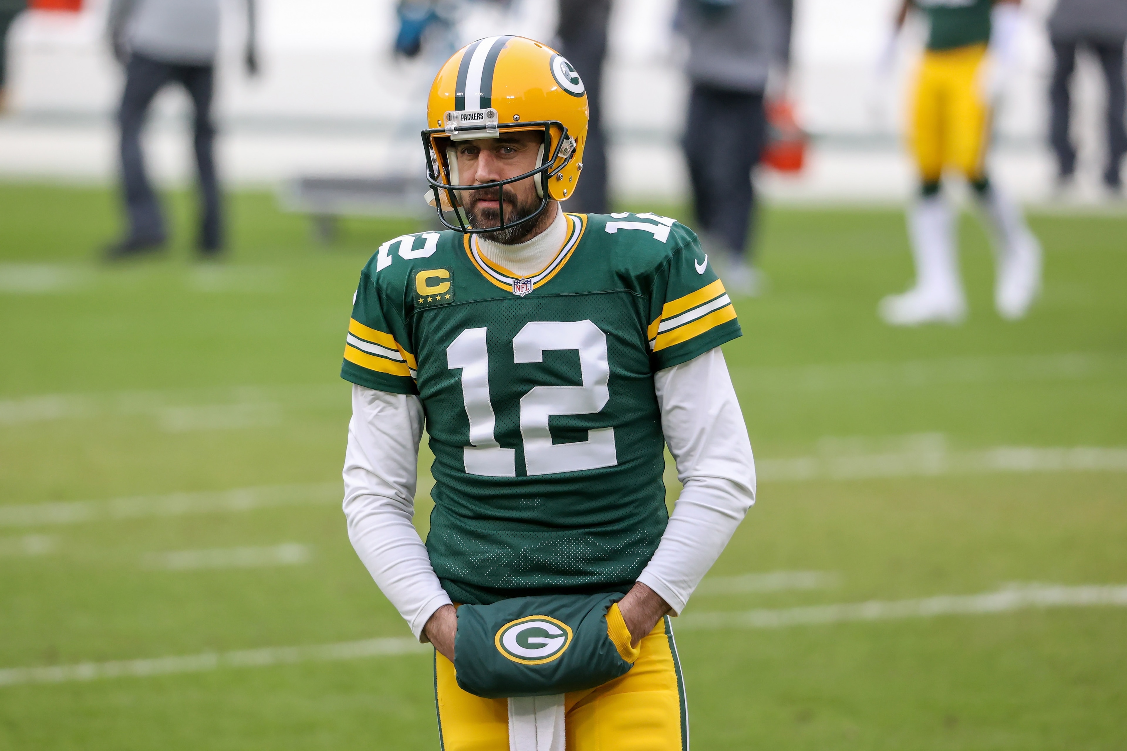 GREEN BAY, WISCONSIN - JANUARY 24: Aaron Rodgers #12 of the Green Bay Packers warms up before the NFC Championship game against the Tampa Bay Buccaneers at Lambeau Field on January 24, 2021 in Green Bay, Wisconsin. (Photo by Dylan Buell/Getty Images) GREEN BAY, WISCONSIN - JANUARY 24: Aaron Rodgers #12 of the Green Bay Packers warms up before the NFC Championship game against the Tampa Bay Buccaneers at Lambeau Field on January 24, 2021 in Green Bay, Wisconsin. (Photo by Dylan Buell/Getty Images)
