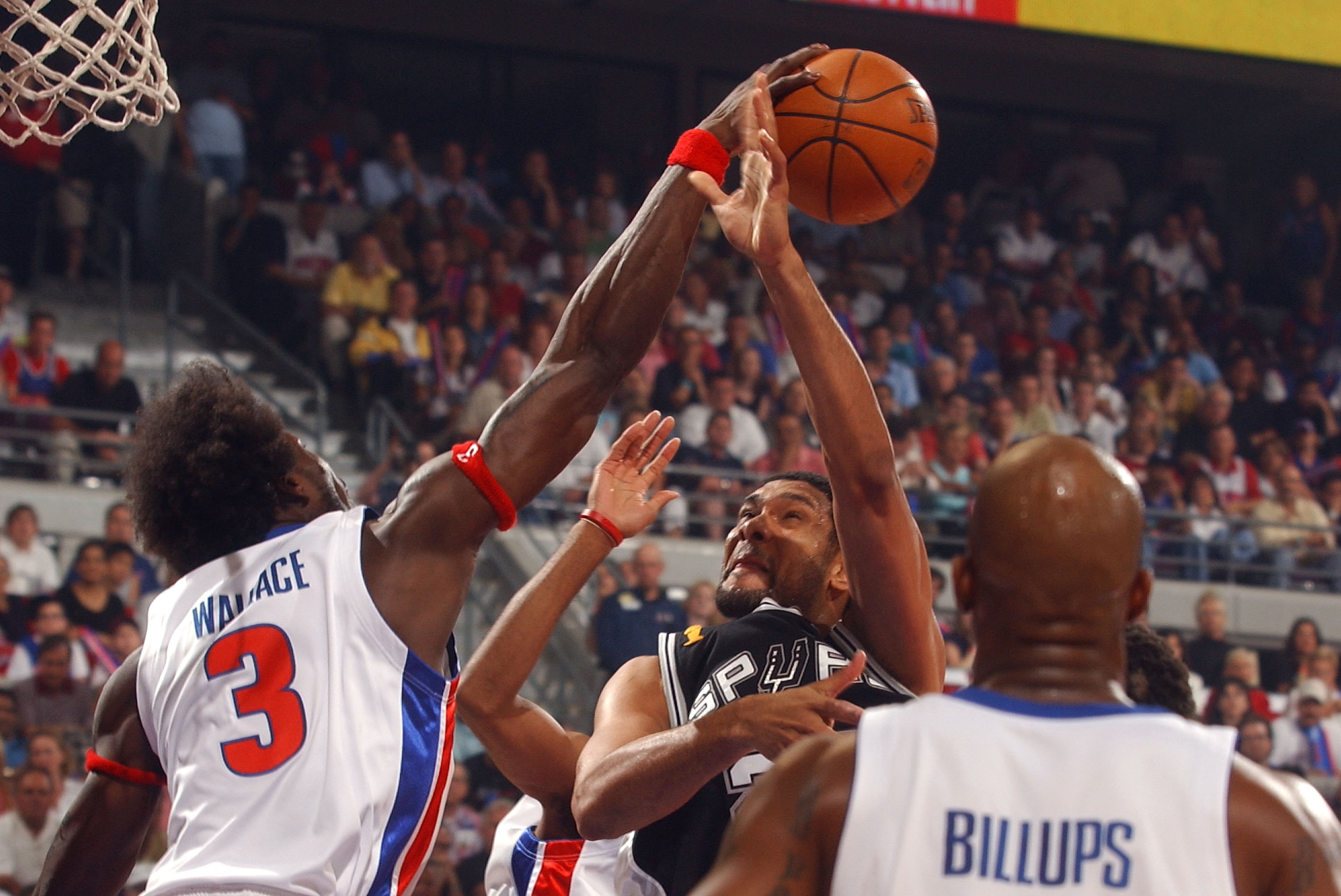 AUBURN HILLS, MI - JUNE 14: Ben Wallace #3 of the Detroit Pistons blocks a shot attempt by Tim Duncan #21 of the San Antonio Spurs in Game Three of the 2005 NBA Finals June 14, 2005 at the Palace of Auburn Hills in Auburn Hills, Michigan. NOTE TO USER: User expressly acknowledges and agrees that, by downloading and or using this photograph, User is consenting to the terms and conditions of the Getty Images License Agreement. Mandatory Copyright Notice: Copyright 2005 NBAE (Photo by Allen Einstein/NBAE via Getty Images) AUBURN HILLS, MI - JUNE 14: Ben Wallace #3 of the Detroit Pistons blocks a shot attempt by Tim Duncan #21 of the San Antonio Spurs in Game Three of the 2005 NBA Finals June 14, 2005 at the Palace of Auburn Hills in Auburn Hills, Michigan. NOTE TO USER: User expressly acknowledges and agrees that, by downloading and or using this photograph, User is consenting to the terms and conditions of the Getty Images License Agreement. Mandatory Copyright Notice: Copyright 2005 NBAE (Photo by Allen Einstein/NBAE via Getty Images)