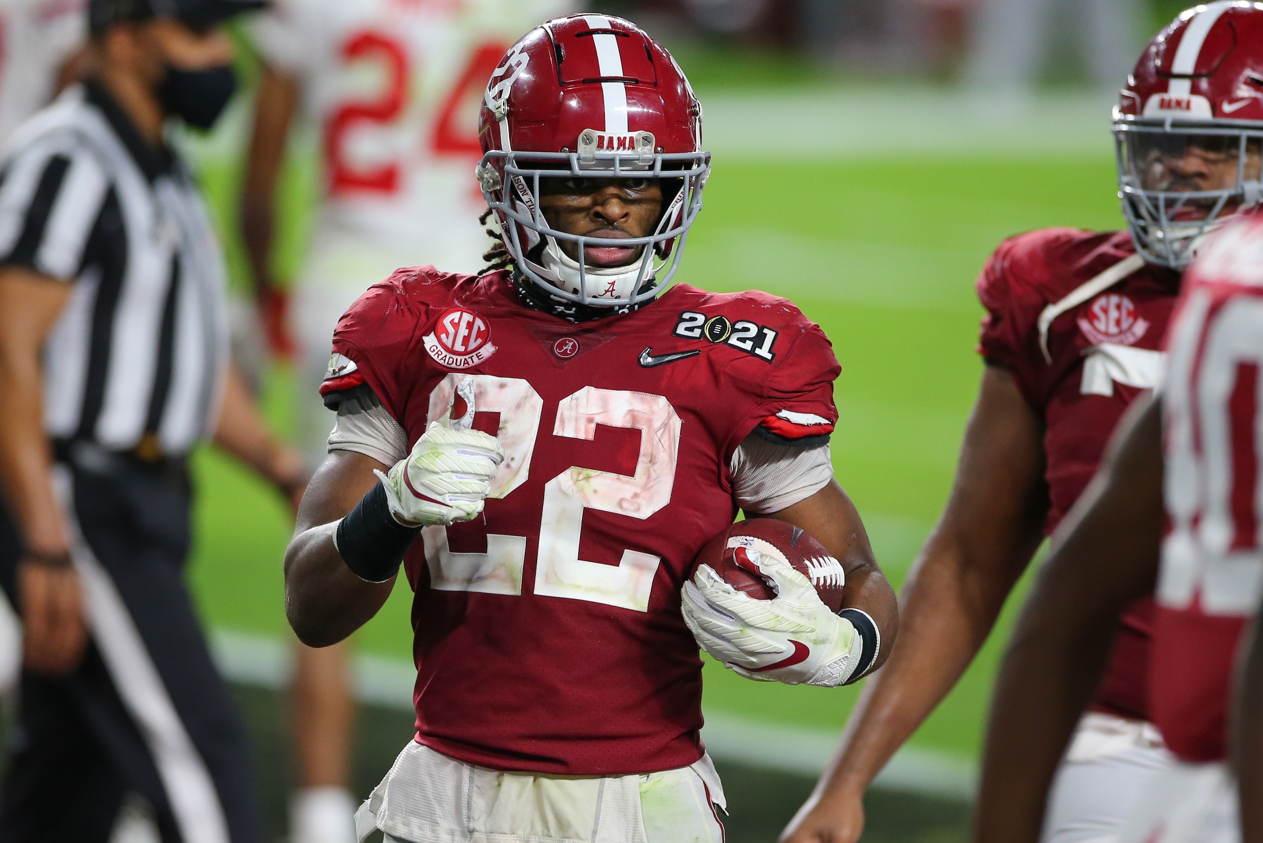 MIAMI GARDENS, FL - JANUARY 11: Alabama Crimson Tide running back Najee Harris (22) celebrates a touchdown during the CFP National Championship game between the Alabama Crimson Tide and the Ohio State Buckeyes on January 11, 2021 at Hard Rock Stadium in Miami Gardens, Fl. (Photo by David Rosenblum/Icon Sportswire via Getty Images)