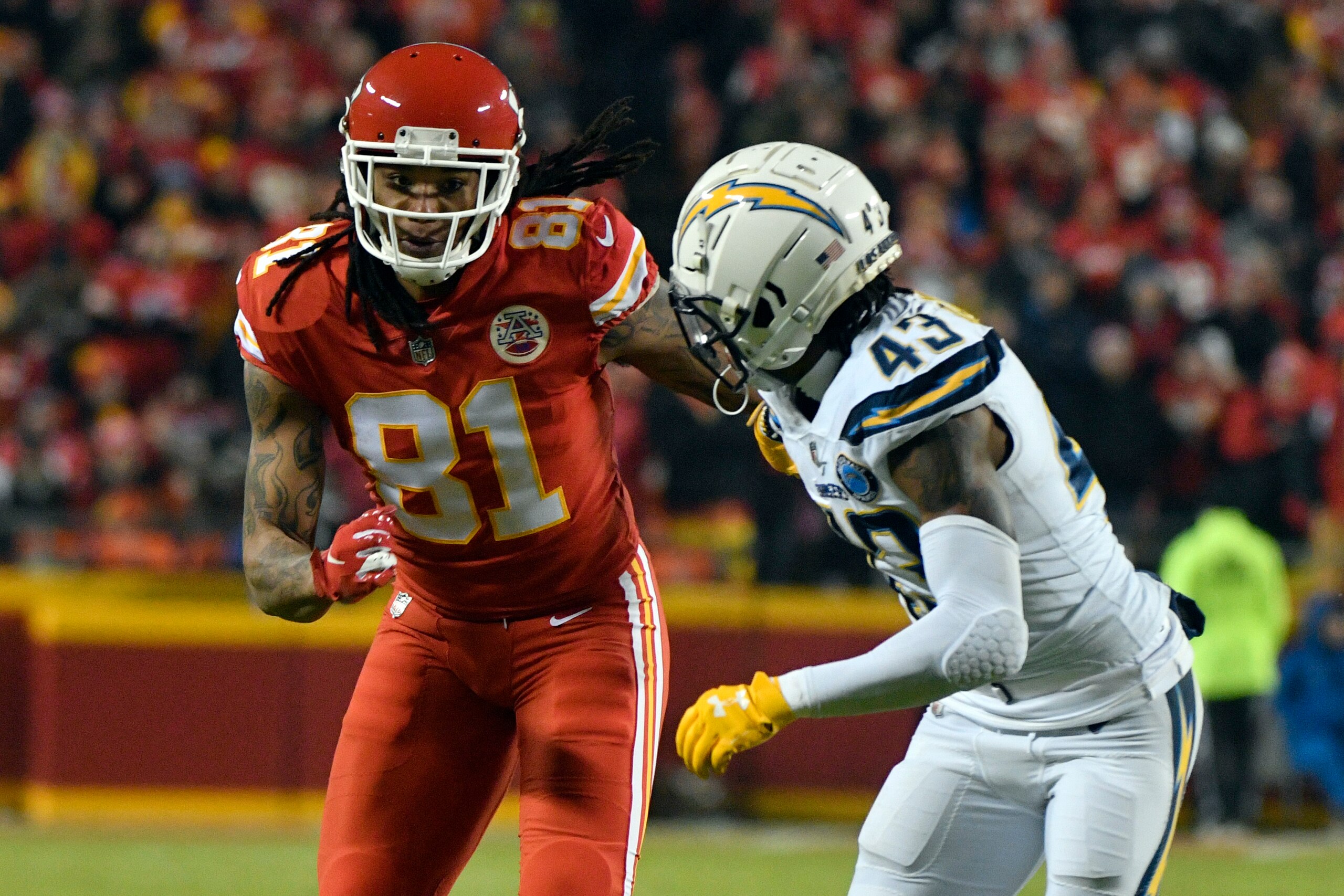 Kansas City Chiefs wide receiver Kelvin Benjamin (81) goes against Los Angeles Chargers cornerback Michael Davis (43) during the second half of an NFL football game in Kansas City, Mo., Thursday, Dec. 13, 2018. (AP Photo/Ed Zurga) Kansas City Chiefs wide receiver Kelvin Benjamin (81) goes against Los Angeles Chargers cornerback Michael Davis (43) during the second half of an NFL football game in Kansas City, Mo., Thursday, Dec. 13, 2018. (AP Photo/Ed Zurga)