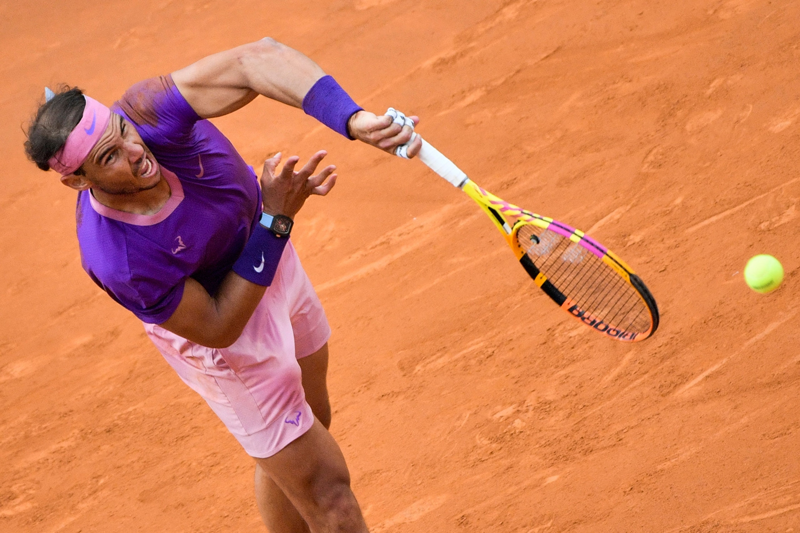 Spain's Rafael Nadal serves to Serbia's Novak Djokovic during the final of the Men's Italian Tennis Open at Foro Italico on May 16, 2021 in Rome, Italy. (Photo by Filippo MONTEFORTE / AFP) (Photo by FILIPPO MONTEFORTE/AFP via Getty Images) Spain's Rafael Nadal serves to Serbia's Novak Djokovic during the final of the Men's Italian Tennis Open at Foro Italico on May 16, 2021 in Rome, Italy. (Photo by Filippo MONTEFORTE / AFP) (Photo by FILIPPO MONTEFORTE/AFP via Getty Images)