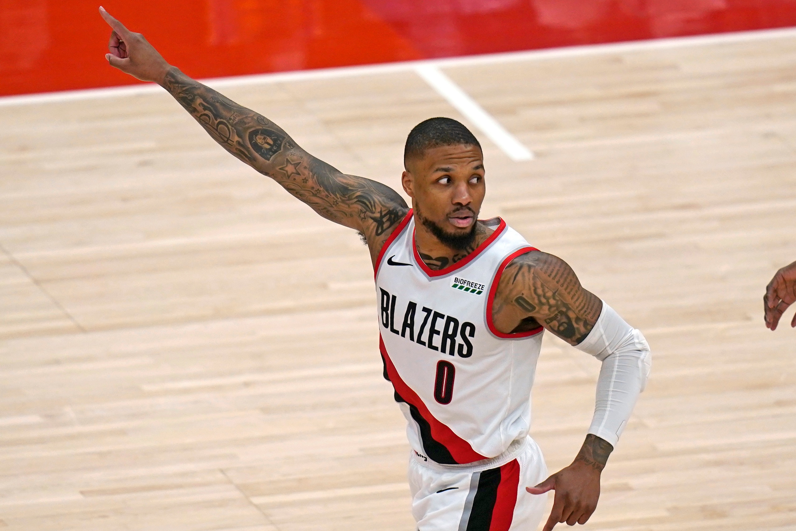 Portland Trail Blazers guard Damian Lillard runs upcourt after scoring against the Utah Jazz during the second half of an NBA basketball game Wednesday, May 12, 2021, in Salt Lake City. (AP Photo/Rick Bowmer) Portland Trail Blazers guard Damian Lillard runs upcourt after scoring against the Utah Jazz during the second half of an NBA basketball game Wednesday, May 12, 2021, in Salt Lake City. (AP Photo/Rick Bowmer)
