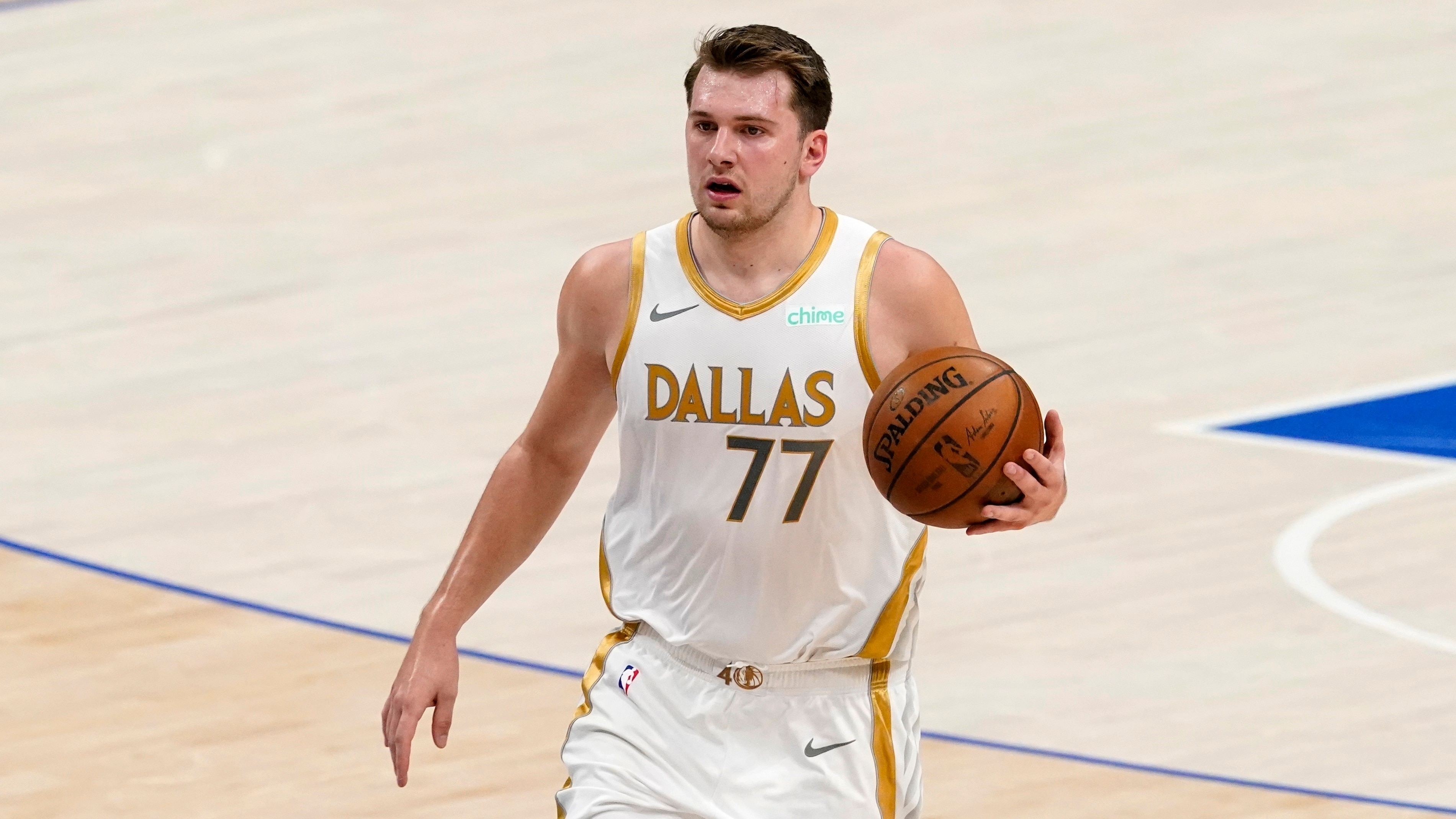 Dallas Mavericks' Luka Doncic advances the ball up court during an NBA basketball game against the Brooklyn Nets in Dallas, Thursday, May 6, 2021. (AP Photo/Tony Gutierrez)