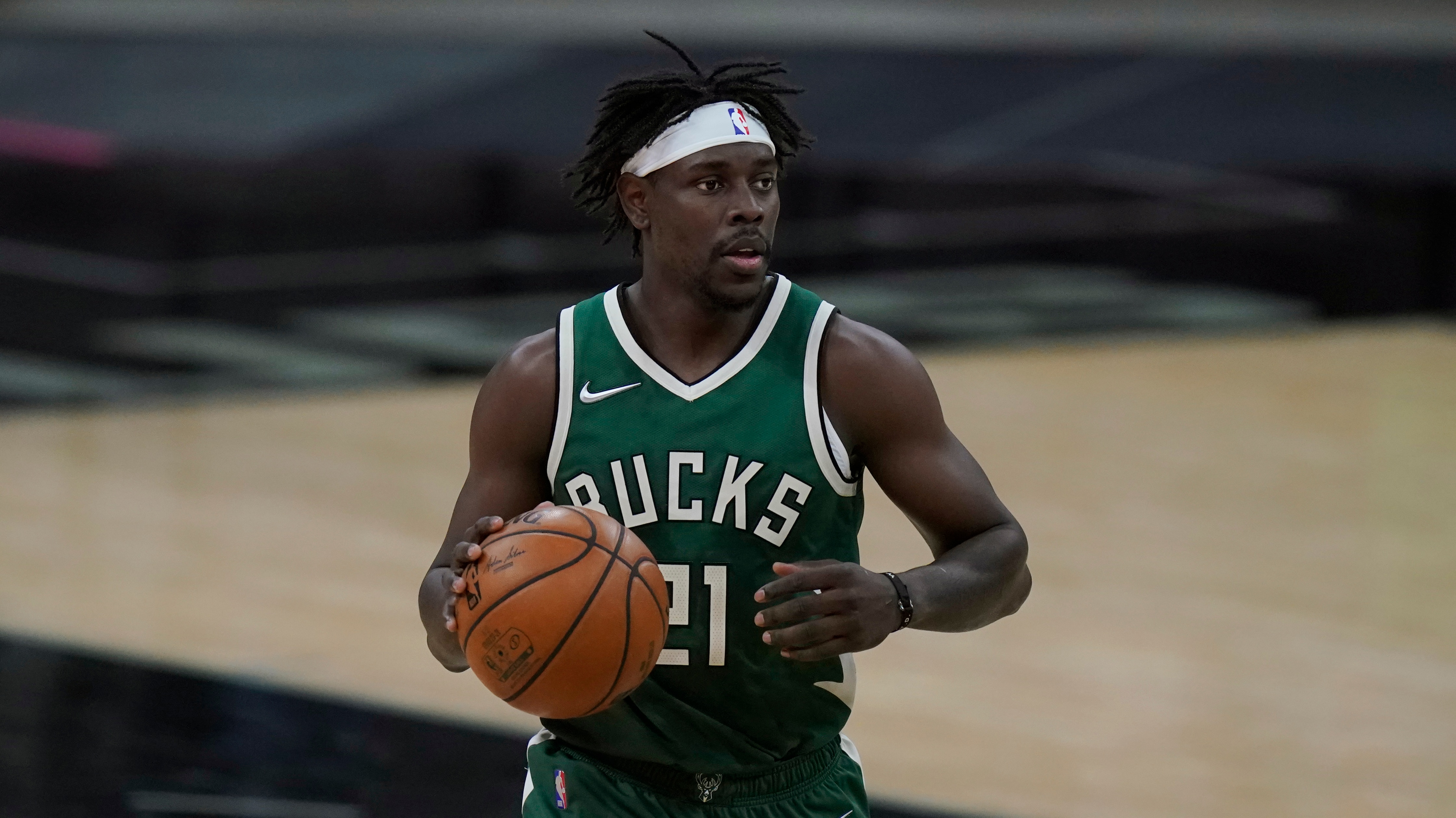Milwaukee Bucks guard Jrue Holiday (21) during the first half of an NBA basketball game against the San Antonio Spurs in San Antonio, Monday, May 10, 2021. (AP Photo/Eric Gay)
