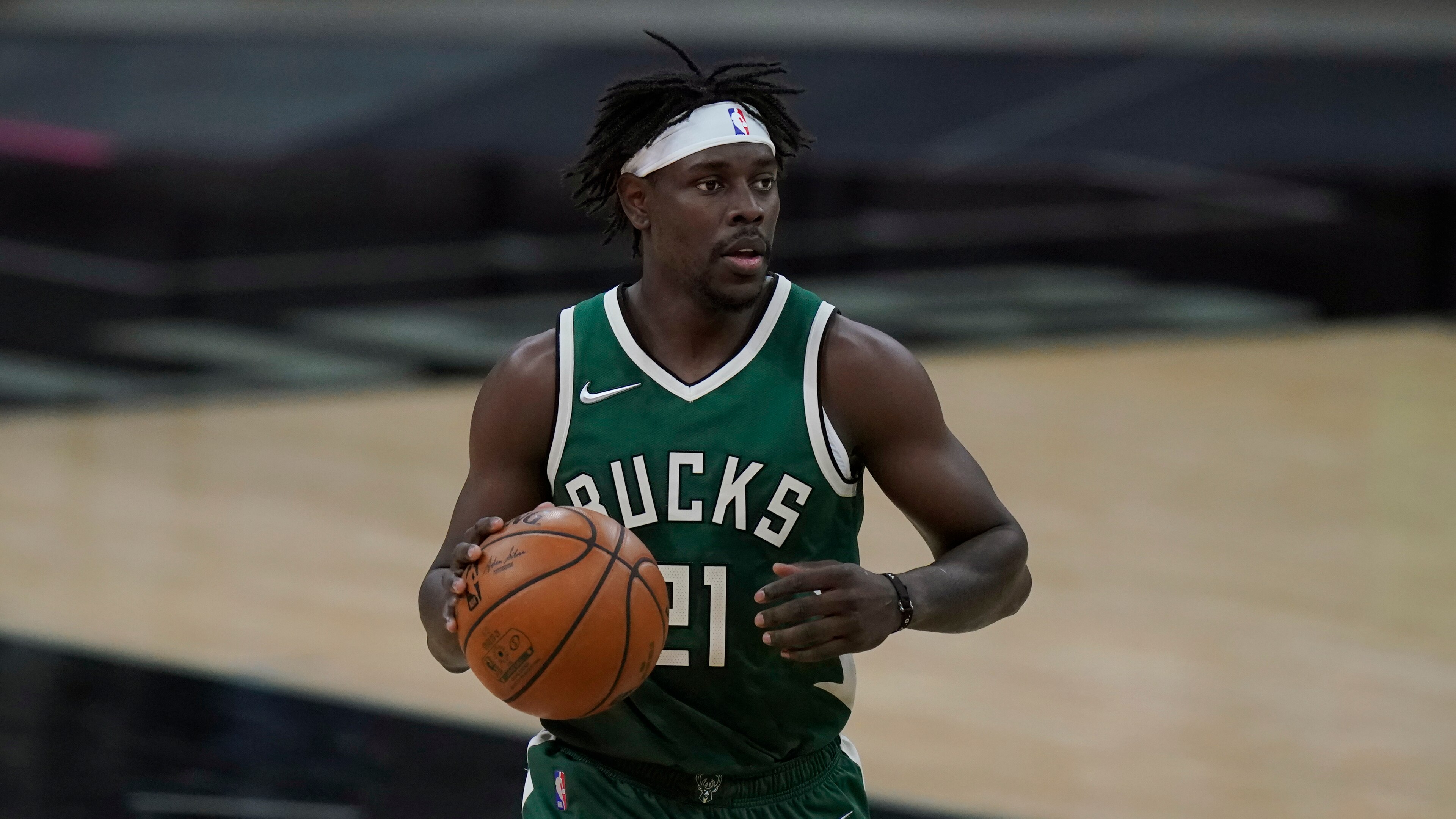 Milwaukee Bucks guard Jrue Holiday (21) during the first half of an NBA basketball game against the San Antonio Spurs in San Antonio, Monday, May 10, 2021. (AP Photo/Eric Gay)