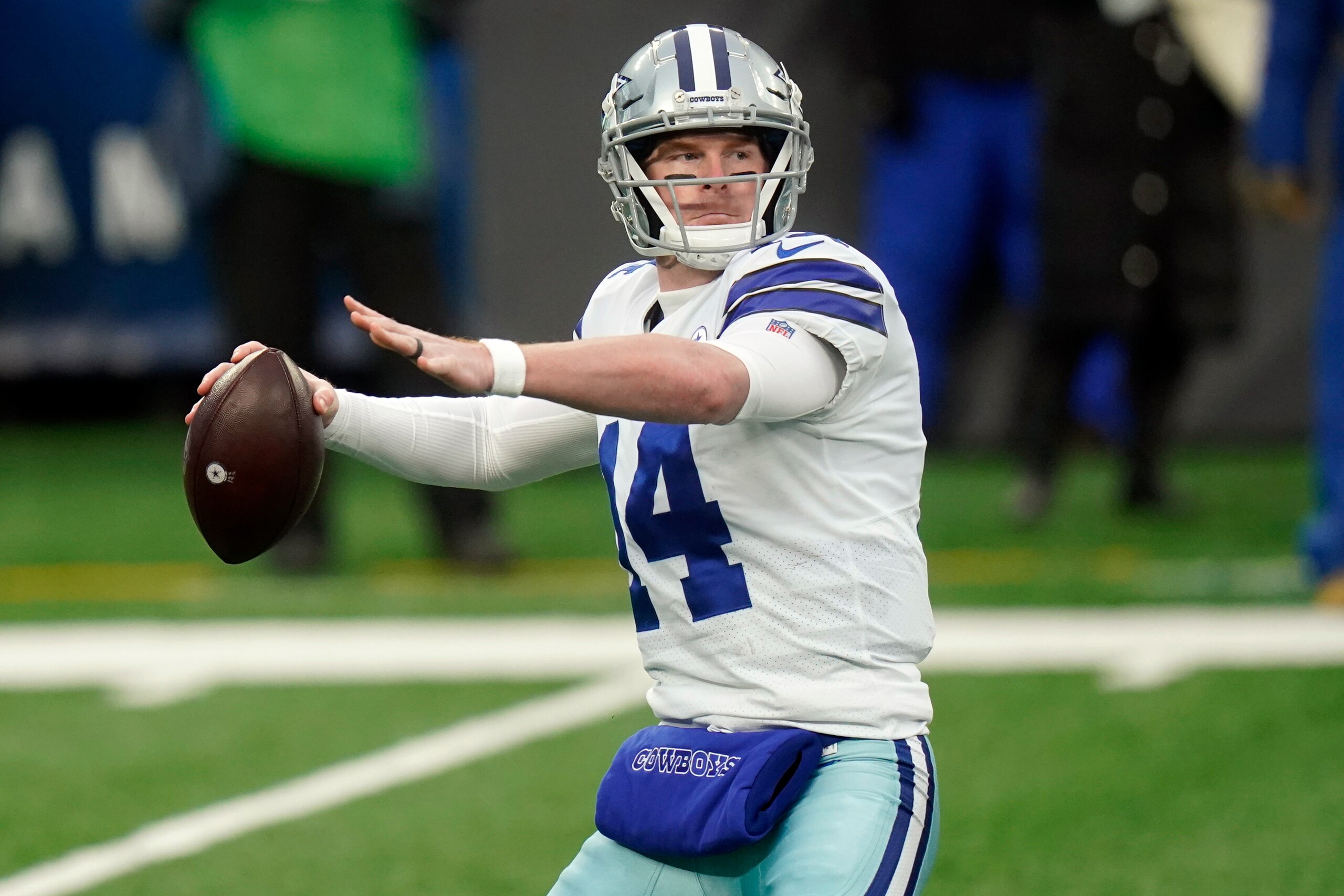 FILE - In this Jan. 3, 2021, file photo, Dallas Cowboys quarterback Andy Dalton looks to pass during the first half of an NFL football game against the New York Giants in East Rutherford, N.J. The Chicago Bears agreed to a one-year, $10 million contract with former Cincinnati Bengals and Dallas Cowboys quarterback Andy Dalton, agent Jeffrey Nalley said Tuesday, March 16, 2021. The three-time Pro Bowler could earn an additional $3 million in bonuses. (AP Photo/Frank Franklin II, File)
