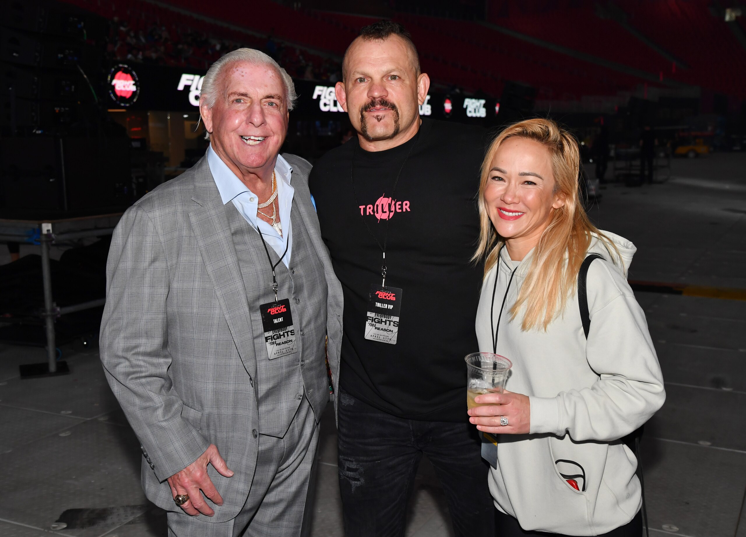 ATLANTA, GEORGIA - APRIL 17: (L-R) Ric Flair, Chuck Liddell, and Malea Rose attend the Triller Fight Club: Jake Paul v Ben Askren at Mercedes-Benz Stadium on April 17, 2021 in Atlanta, Georgia. (Photo by Jeff Kravitz/Getty Images for Triller)