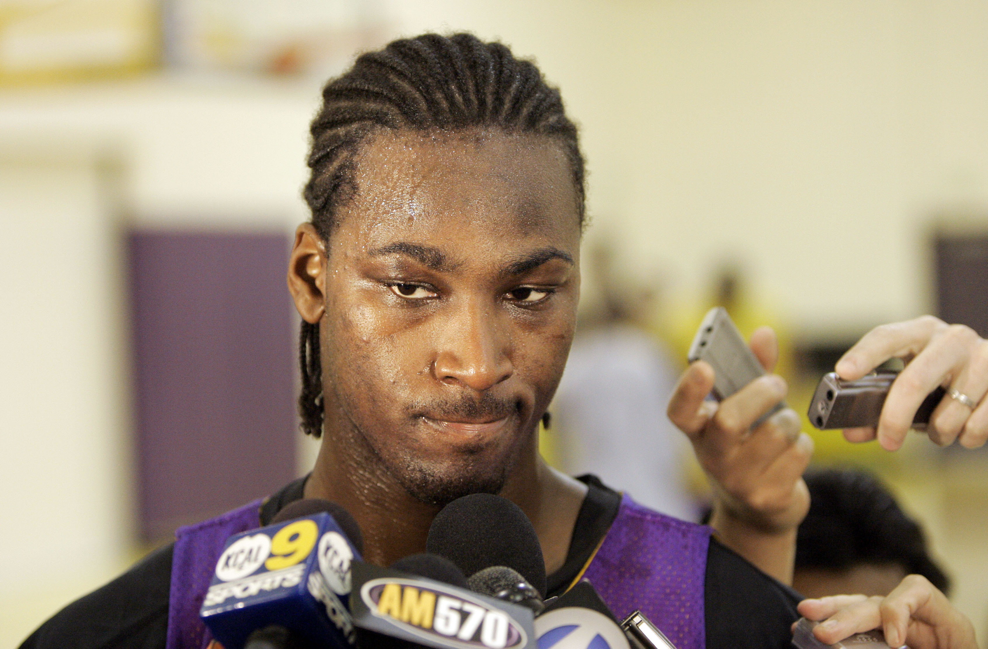 FILE - In this May 3, 2006 file photo, Los Angeles Lakers' Kwame Brown speaks to the media during a team practice in El Segundo, Calif. For every Hall of Fame-level big man like Shaquille O'Neal, David Robinson, Tim Duncan and Hakeem Olajuwon, there's a Pervis Ellison, Michael Olowokandi, Kwame Brown and Greg Oden to serve as a cautionary tale.(AP Photo/Kevork Djansezian, File)