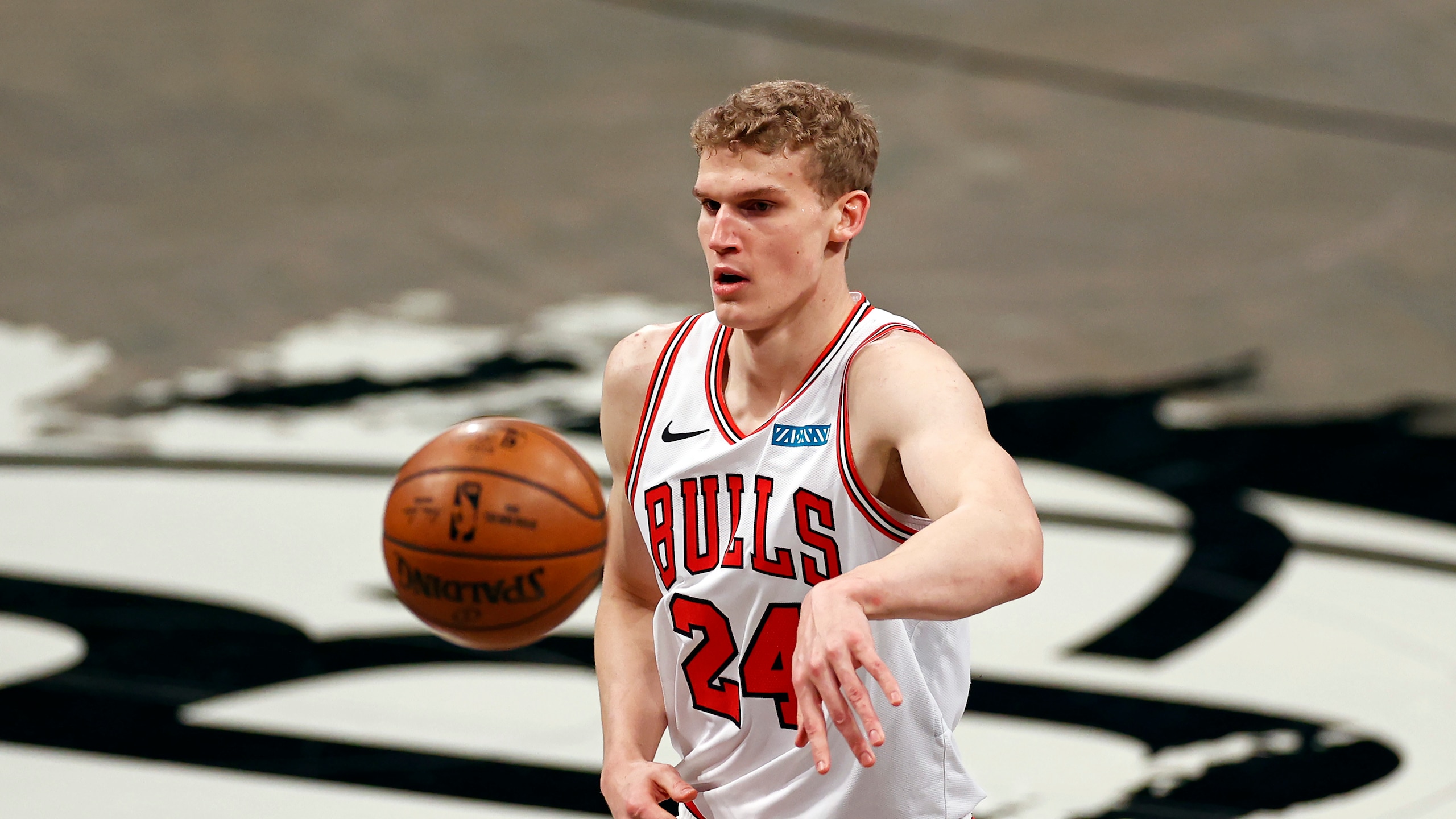 Chicago Bulls forward Lauri Markkanen (24) passes the ball against the Brooklyn Nets during the first half of an NBA basketball game Saturday, May 15, 2021, in New York. (AP Photo/Adam Hunger)
