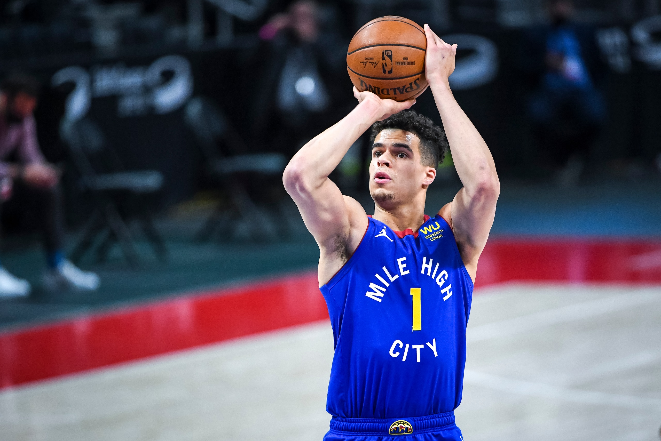 DETROIT, MICHIGAN - MAY 14: Michael Porter Jr. #1 of the Denver Nuggets shoots a free throw against the Detroit Pistons during the first quarter of the NBA game at Little Caesars Arena on May 14, 2021 in Detroit, Michigan. NOTE TO USER: User expressly acknowledges and agrees that, by downloading and or using this photograph, User is consenting to the terms and conditions of the Getty Images License Agreement. (Photo by Nic Antaya/Getty Images)