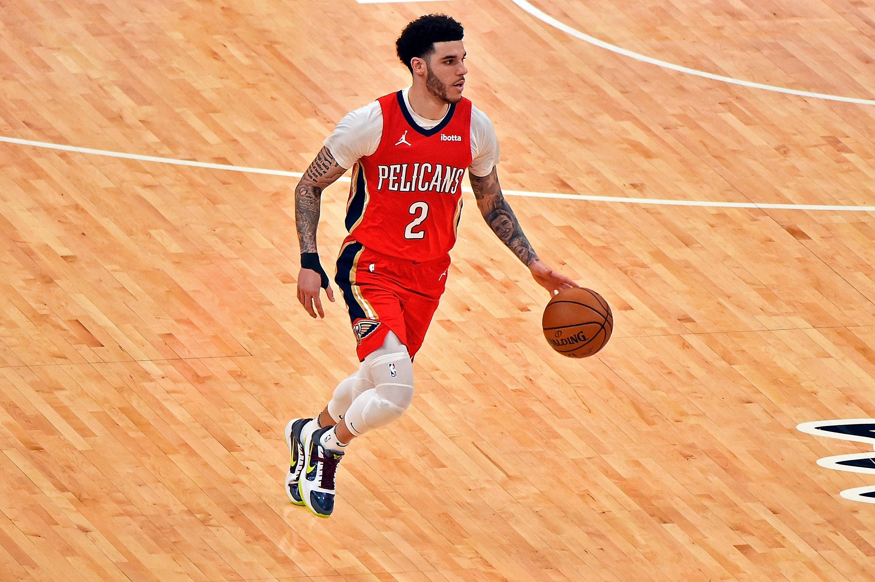 MEMPHIS, TENNESSEE - MAY 10: Lonzo Ball #2 of the New Orleans Pelicans brings the ball up court during the second half against the Memphis Grizzlies at FedExForum on May 10, 2021 in Memphis, Tennessee. NOTE TO USER: User expressly acknowledges and agrees that, by downloading and or using this photograph, User is consenting to the terms and conditions of the Getty Images License Agreement. (Photo by Justin Ford/Getty Images)