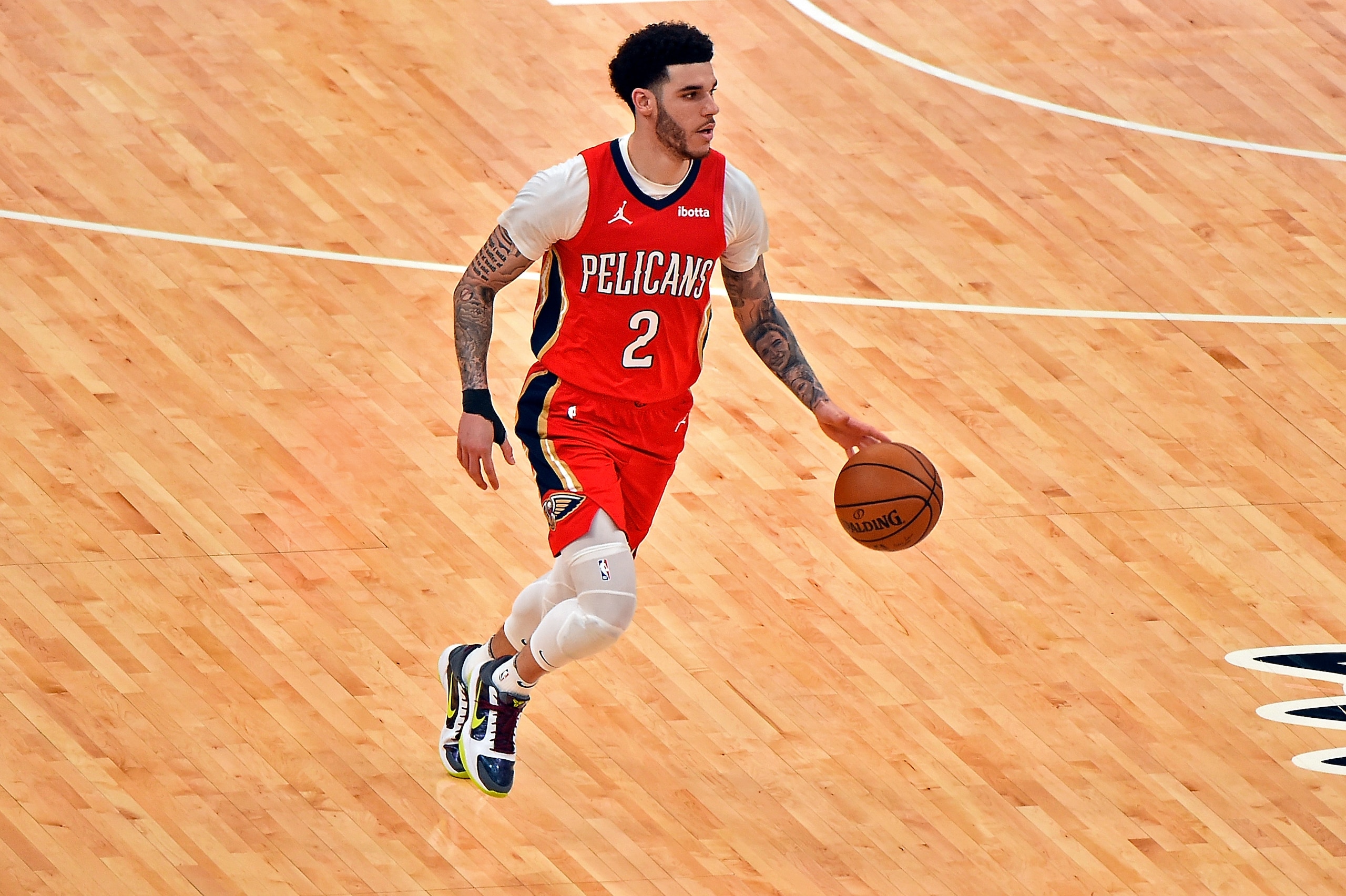 MEMPHIS, TENNESSEE - MAY 10: Lonzo Ball #2 of the New Orleans Pelicans brings the ball up court during the second half against the Memphis Grizzlies at FedExForum on May 10, 2021 in Memphis, Tennessee. NOTE TO USER: User expressly acknowledges and agrees that, by downloading and or using this photograph, User is consenting to the terms and conditions of the Getty Images License Agreement. (Photo by Justin Ford/Getty Images)