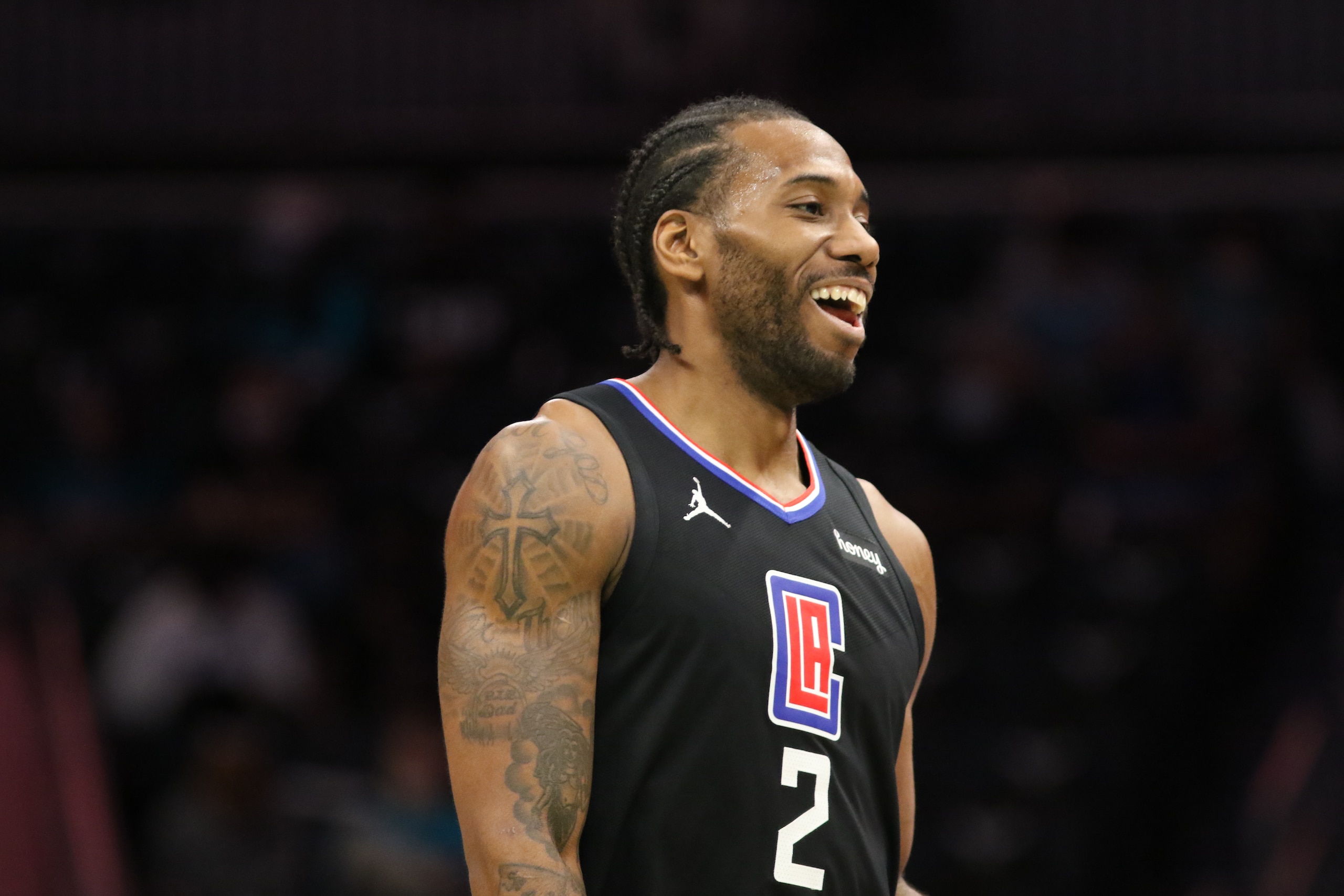 CHARLOTTE, NC - MAY 13: Kawhi Leonard #2 of the LA Clippers smiles during the game against the Charlotte Hornets on May 13, 2021 at Spectrum Center in Charlotte, North Carolina. NOTE TO USER: User expressly acknowledges and agrees that, by downloading and or using this photograph, User is consenting to the terms and conditions of the Getty Images License Agreement.  Mandatory Copyright Notice:  Copyright 2021 NBAE (Photo by Brock Williams-Smith/NBAE via Getty Images)