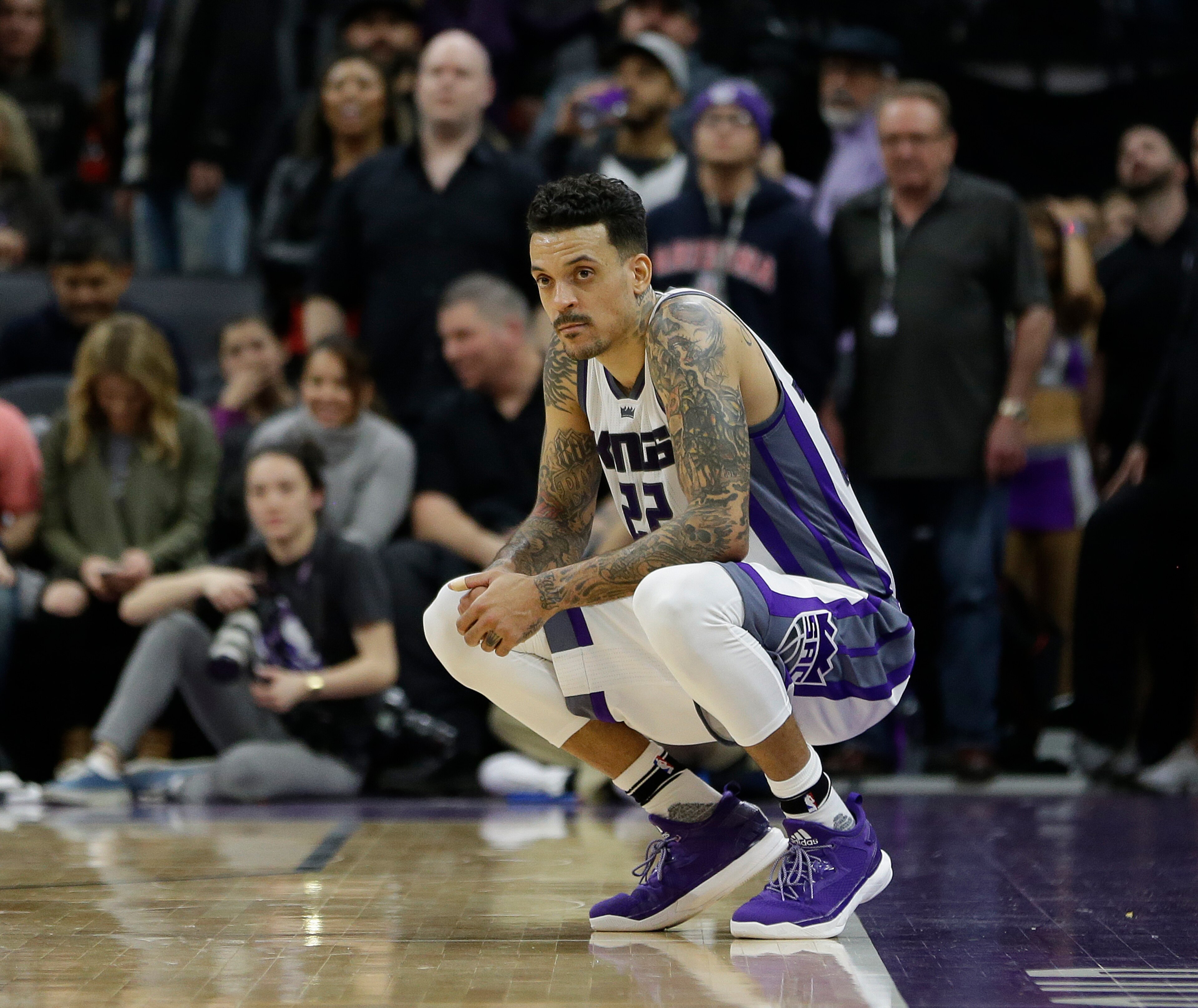 Sacramento Kings forward Matt Barnes squats after his inbound pass to teammate DeMarcus Cousins was stolen by Chicago Bulls guard Dwyane Wade who went for a breakaway stuff during the closing moments of an NBA basketball game Monday, Feb. 6, 2017, in Sacramento, Calif. The Bulls won 112-107. (AP Photo/Rich Pedroncelli)