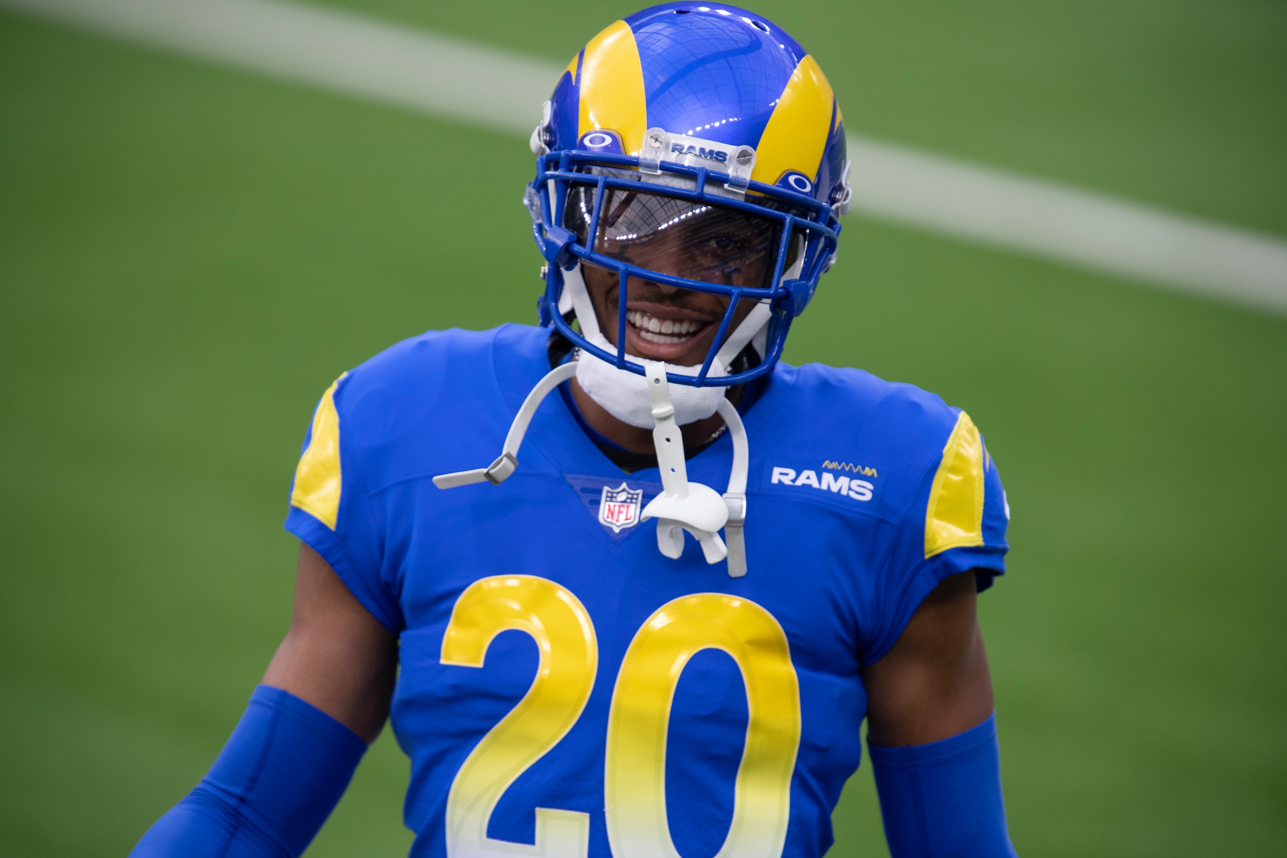 Los Angeles Rams cornerback Jalen Ramsey (20) smiles before an NFL football game against the Arizona Cardinals Sunday, Jan. 3, 2021, in Inglewood, Calif. (AP Photo/Kyusung Gong)
