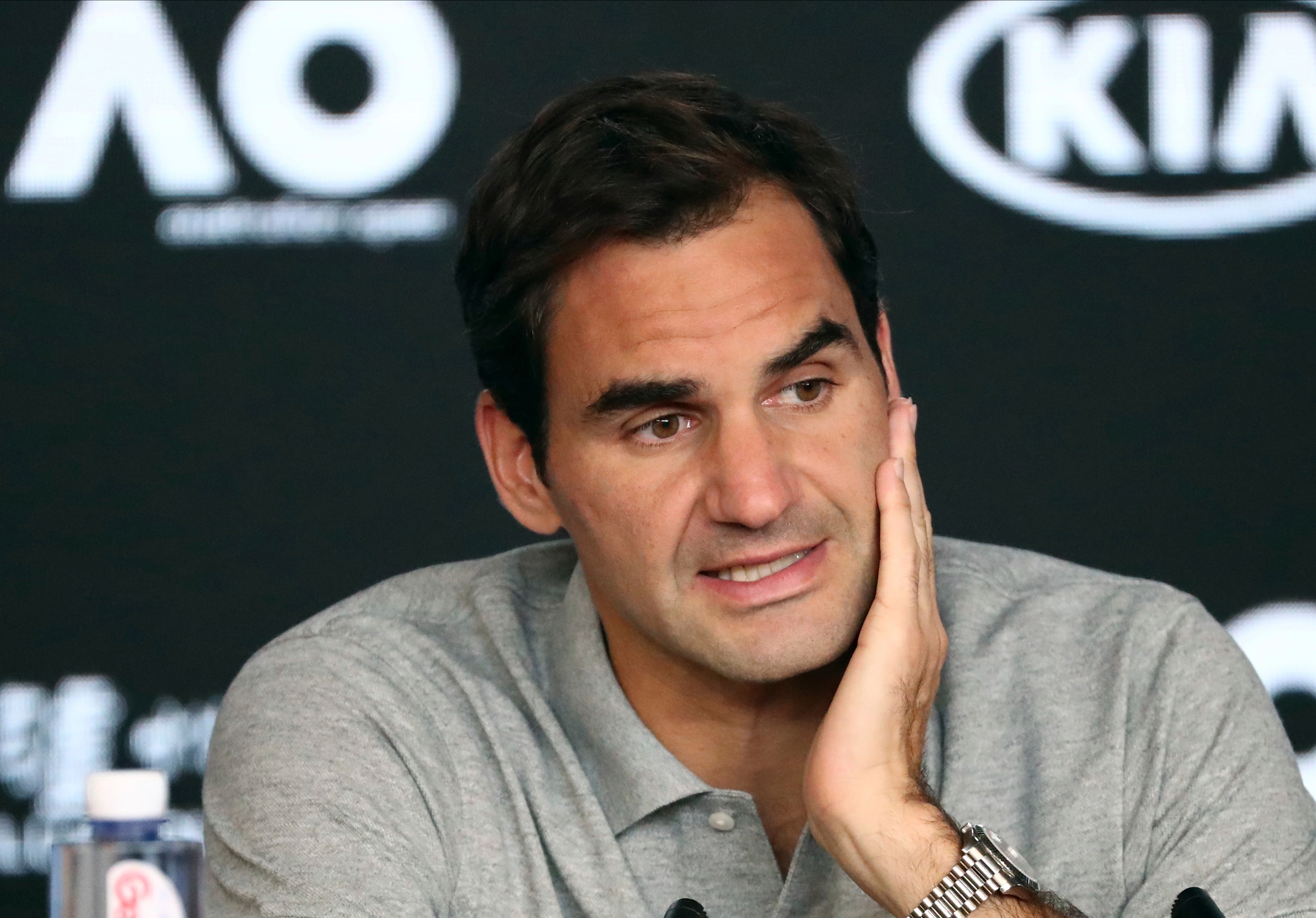 FILE - In this Jan. 30, 2020, file photo, Switzerland's Roger Federer speaks during a press conference following his semifinal loss to Serbia's Novak Djokovic at the Australian Open tennis championship in Melbourne, Australia. Federer leads the annual Forbes ranking of highest-paid athletes with what the magazine says is $106.3 million in total earnings. He is the first tennis player top the list since it was first compiled in 1990. (AP Photo/Dita Alangkara, File)